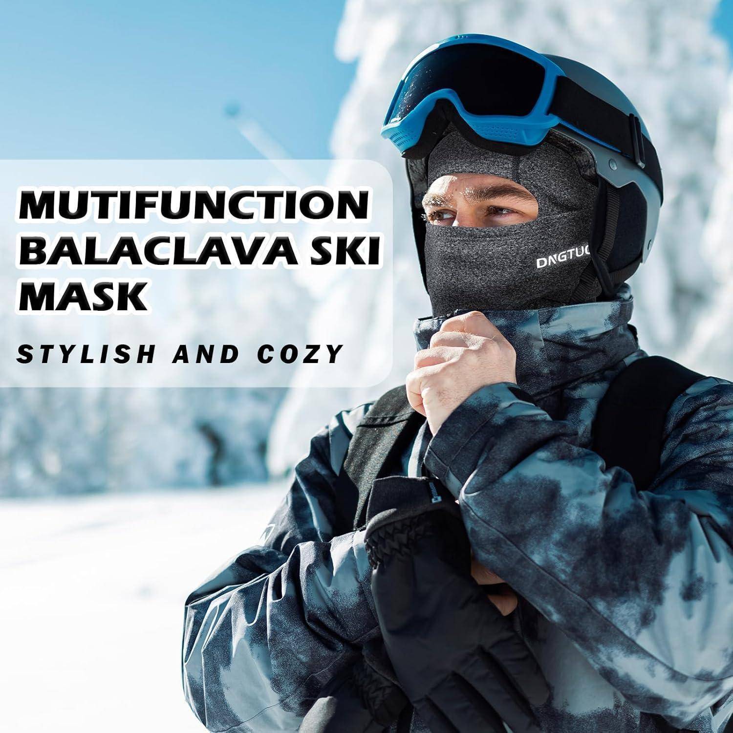 Person in Skihelmut und Schutzbrille, der einen schwarzen Sturmhaube-Skischleier und eine Winterjacke trägt, mit Text, der liest „MULTIFUNKTIONALE STURMHAUBE SKISCHLEIER" und „STILVOLL UND GEMÜTLICH"".