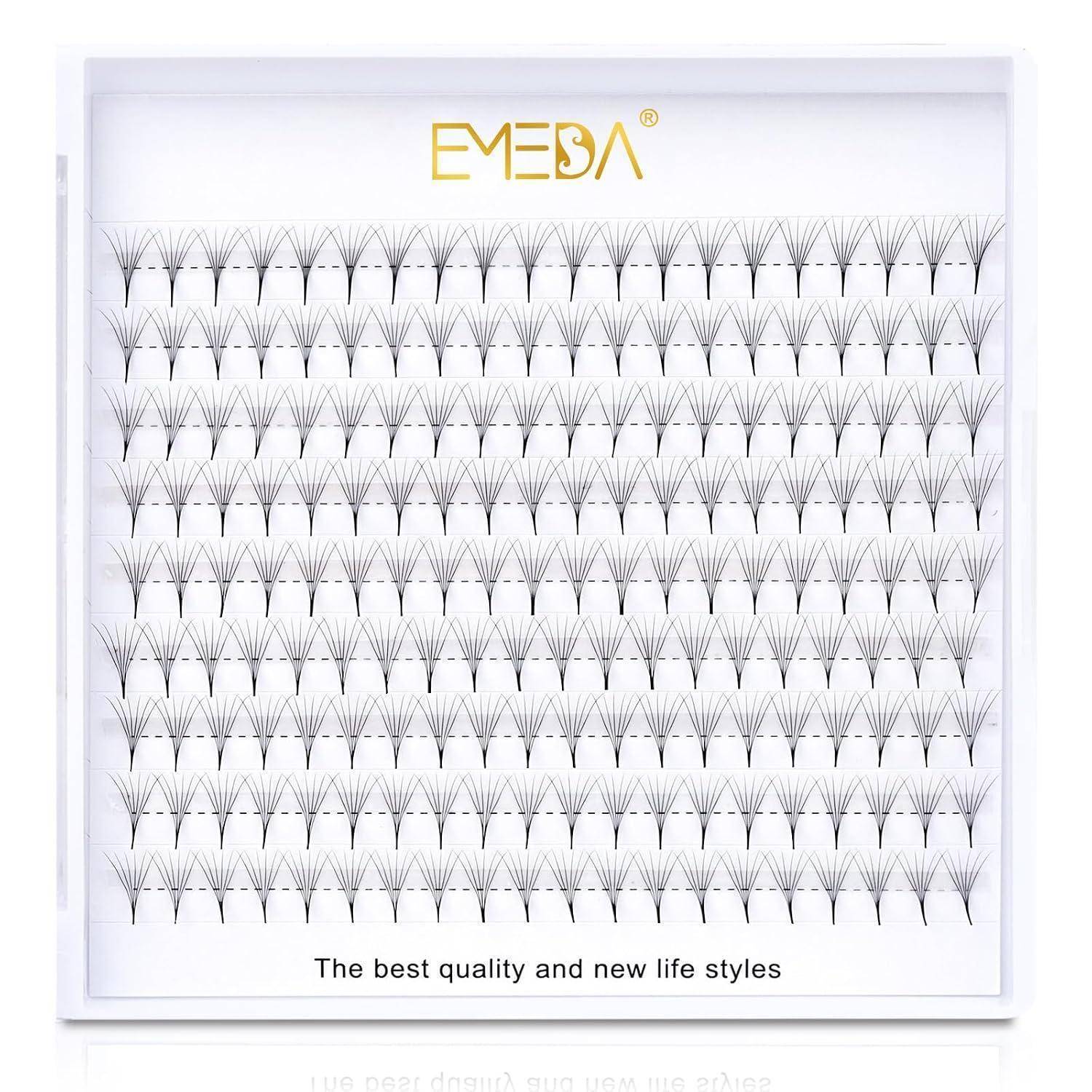 Schachtel mit falschen Wimpern mit vielen fächerförmigen Wimpernbündeln, Marke 'EMEBA', und dem Slogan 'The best quality and new life styles'.