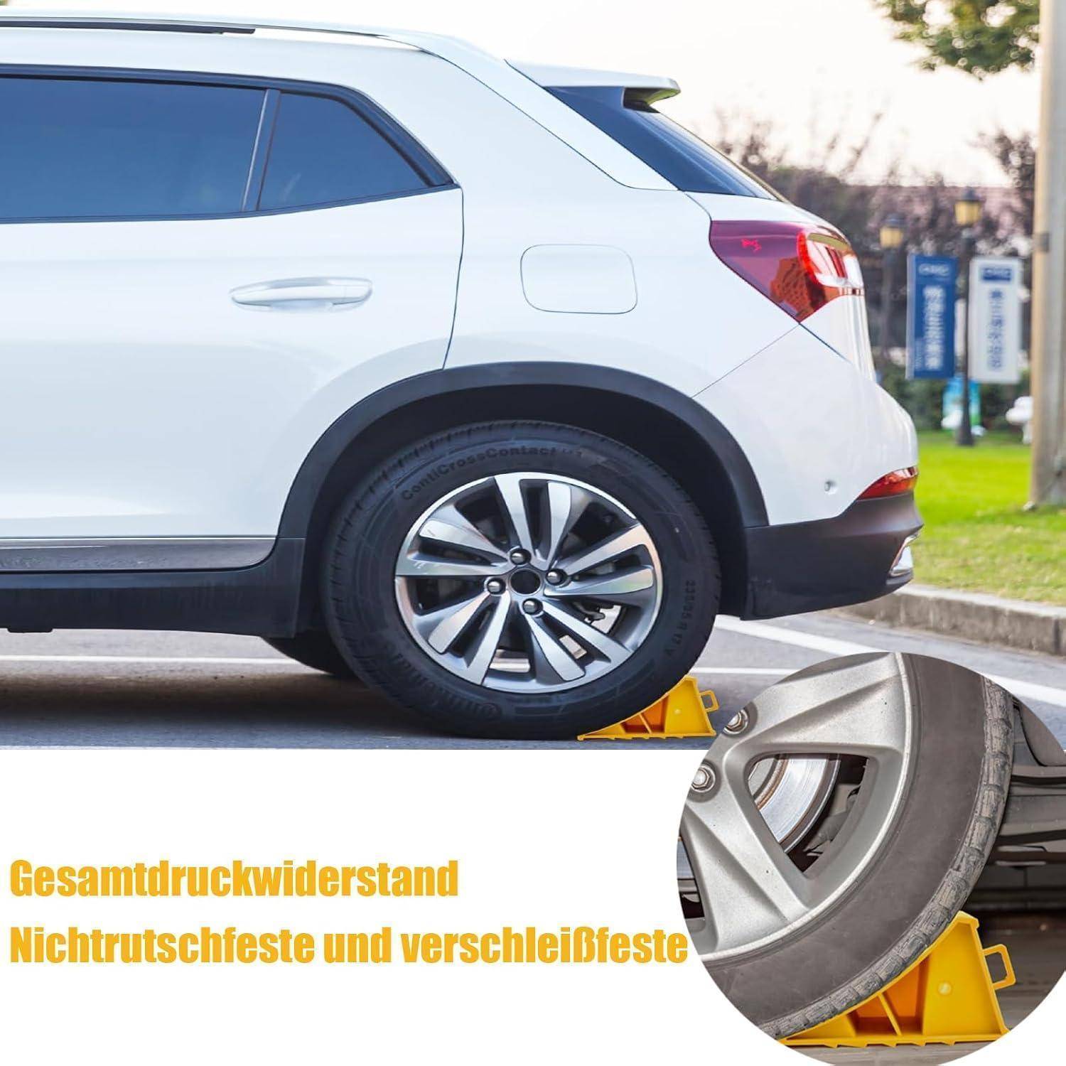 Weißer SUV geparkt auf einer gelben Radklemme; deutscher Text besagt „totale Druckbeständigkeit, rutschfest und verschleißfest