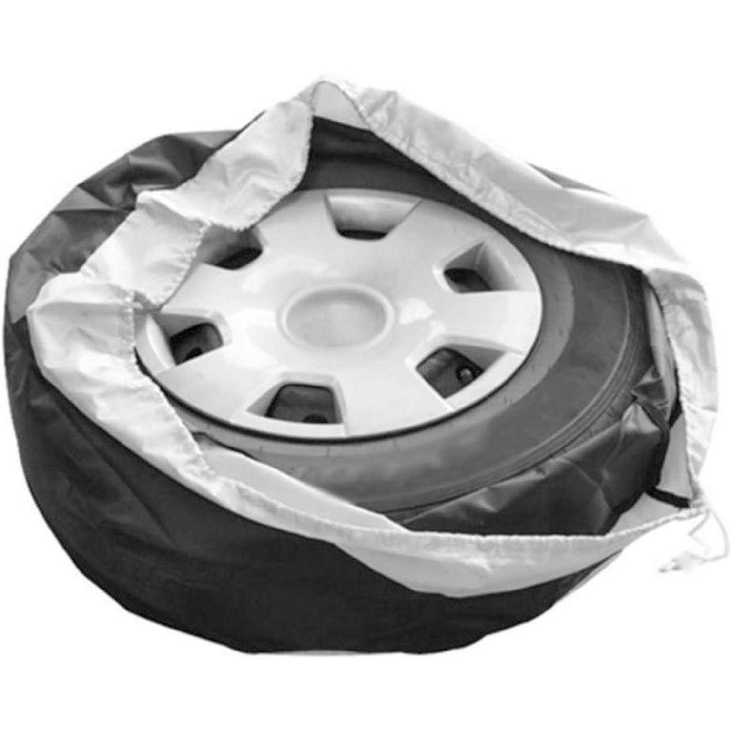 Ein Autoreifen, der in einer Schutzspeichertasche mit einer silbernen und schwarzen Abdeckung verpackt ist, die teilweise um das Rad geöffnet ist.