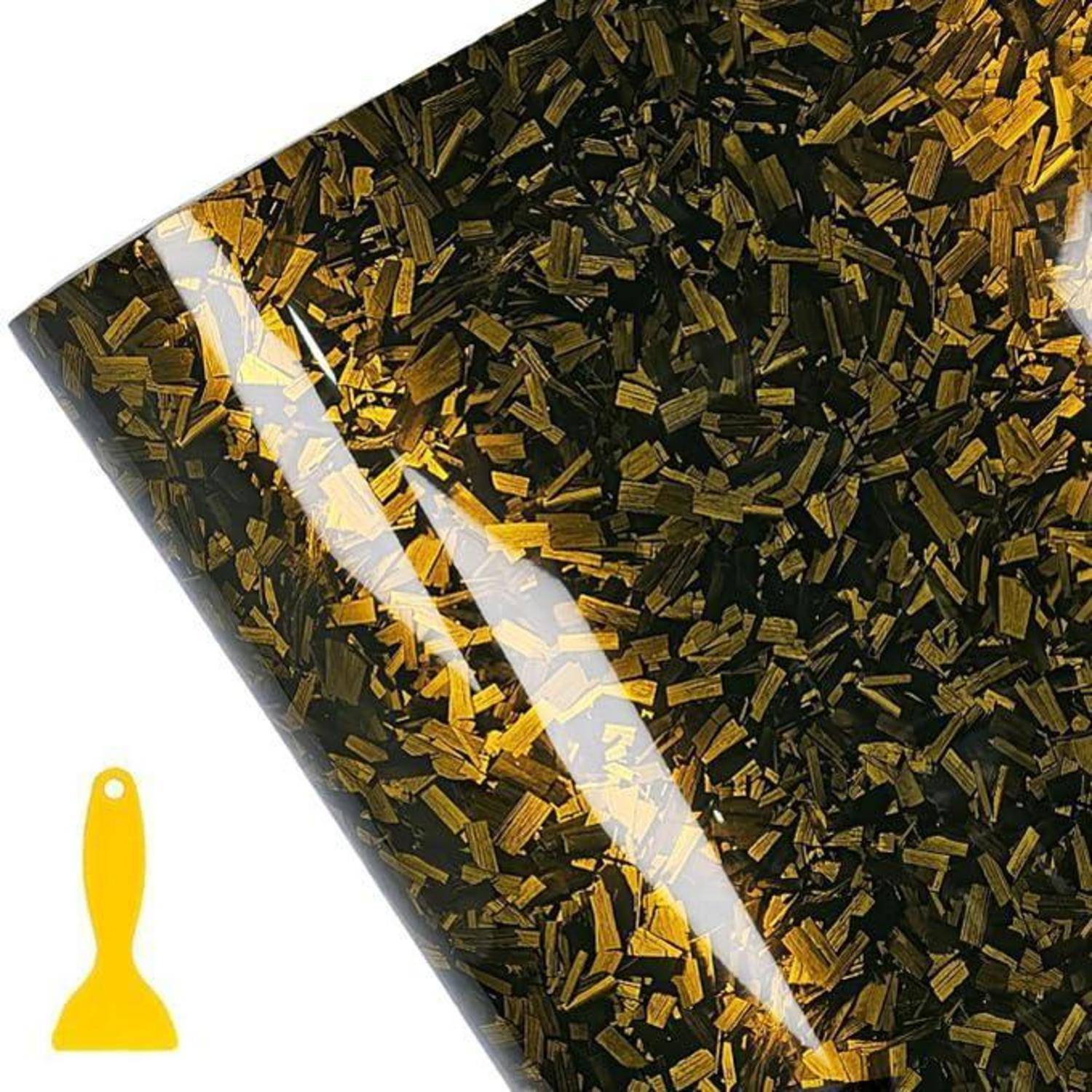Nahaufnahme einer glänzend schwarzen Oberfläche mit Goldflöckchen, dargestellt mit einem kleinen gelben Werkzeugsymbol in der unteren linken Ecke.