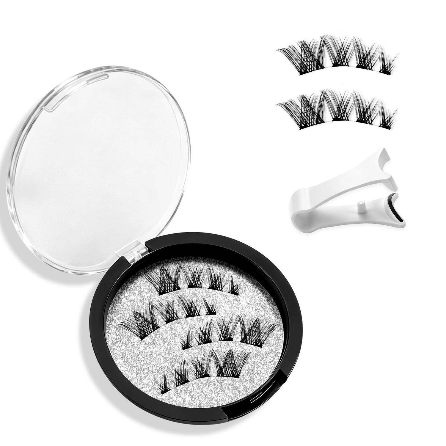 Rundlicher Makeup-Kompakt mit falschen Wimpern, plus Wimpernstreifen und Applikator auf weißem Hintergrund.