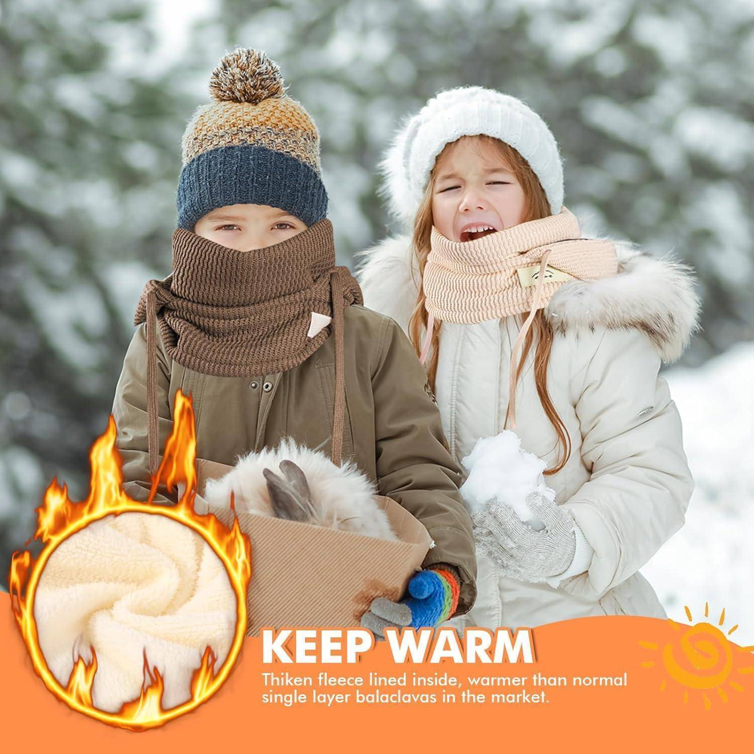 Zwei in Winterkleidung gehüllte Kinder halten Schnee; eine Anzeige bewirbt einen futter-gefütterten Sturmhaube mit dem Text „KEEP WARM