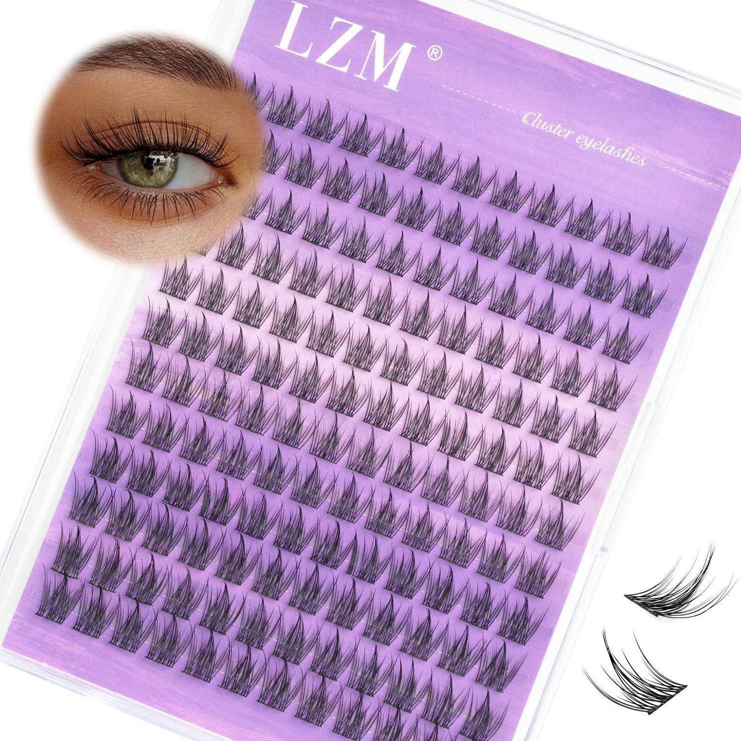 Paket mit LZM-Cluster-Wimpern mit einer Musteraugenprobe, die lange, dicke künstliche Wimpern zeigt, und zwei lose Wimperncluster neben dem Tablett.