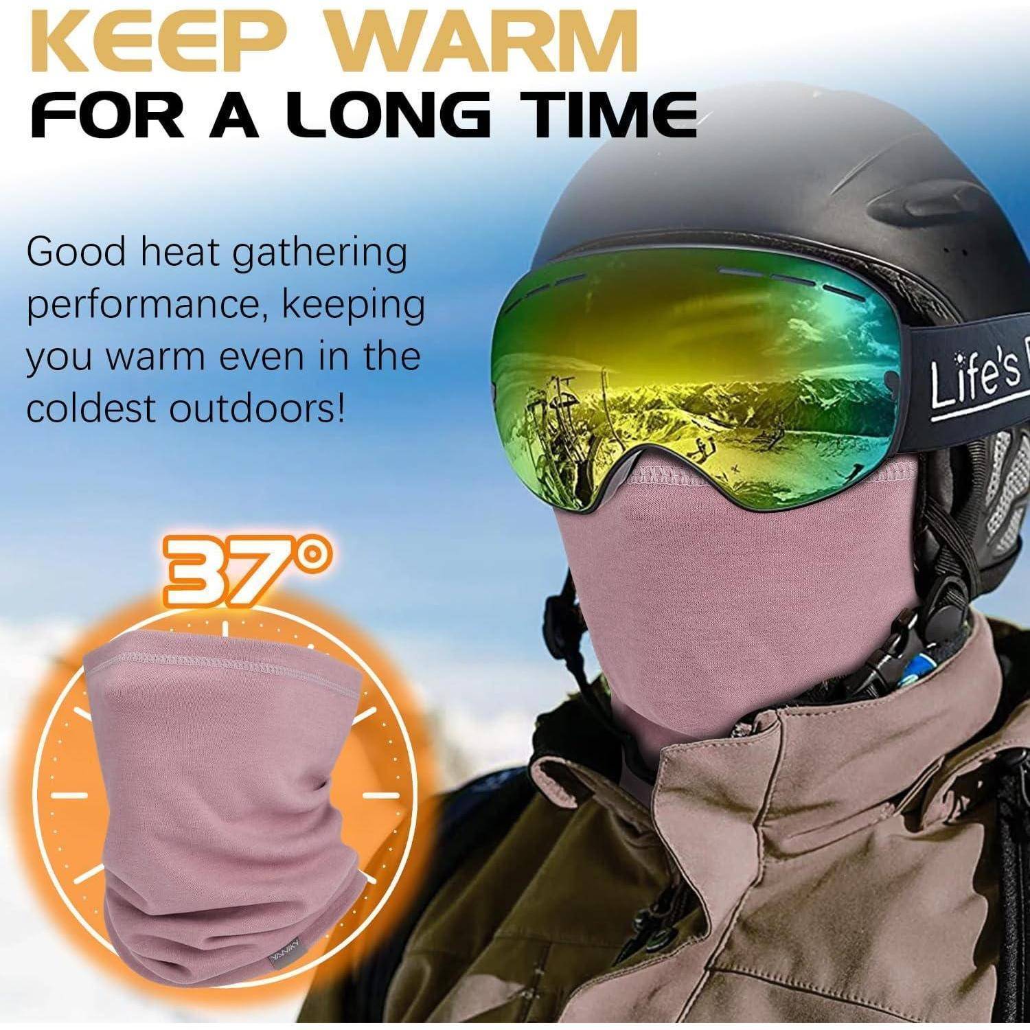 Werbebild eines Skifahrers mit rosa Gesichtsmaske und Skibrille, mit dem Text „BLEIBEN SIE LANGE WARM