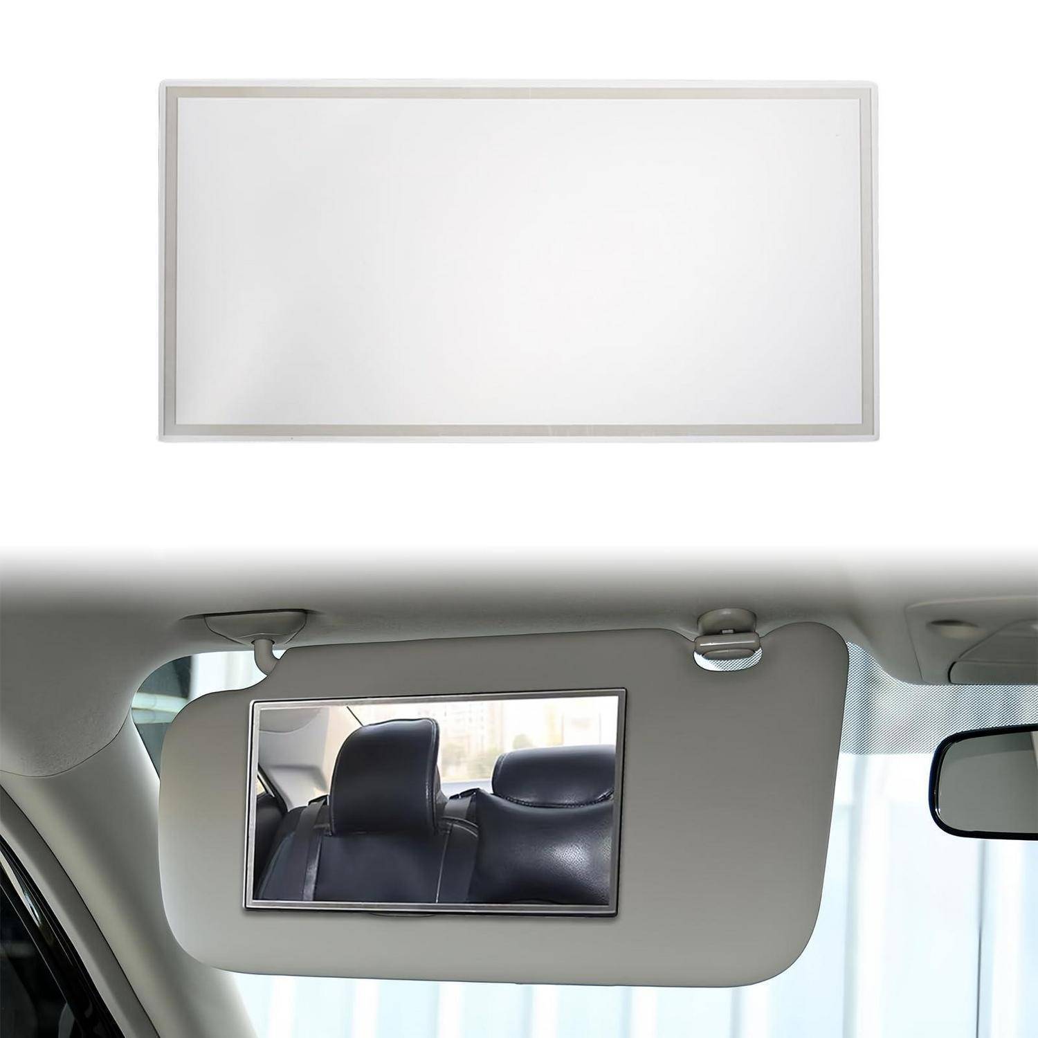 Sonnenblende im Auto mit integriertem rechteckigem Klapppiegel, dargestellt offen über dem Beifahrersitz.