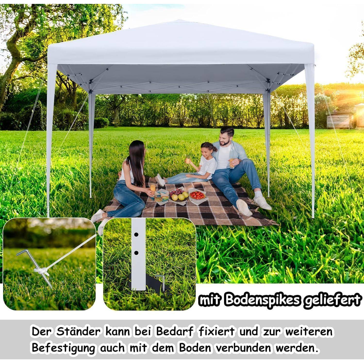 Familienpicknick unter einem weißen Pavillon auf Gras, mit vergrößerten Ausschnitten, die Bodenspikes und den Text "mit Bodenspikes geliefert"" und ""Der Ständer kann bei Bedarf fixiert..."" zeigen.