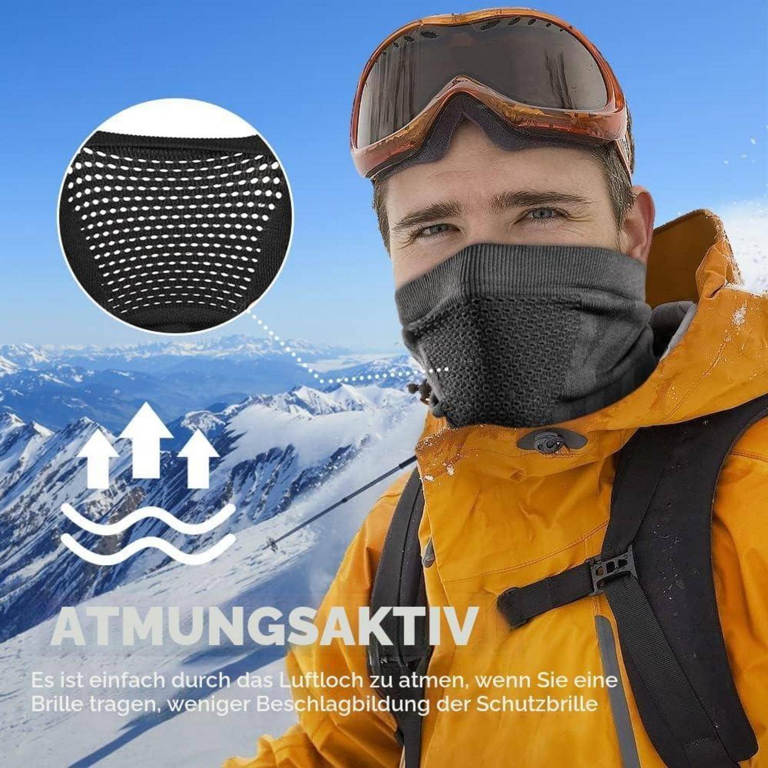 Skibergsteiger in orangefarbener Jacke und Schutzbrille, der eine schwarze atmungsaktive Gesichtsmaske trägt; die Vergrößerung zeigt das Maskenstoff und den Text „ATMUNGSAKTIV