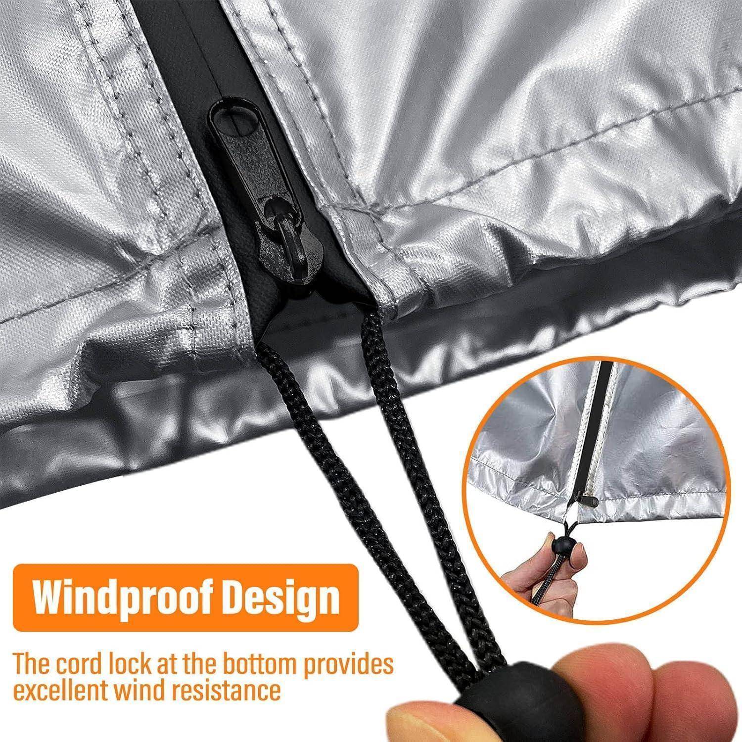 Nahaufnahme eines silbernen Jackensaums mit einer Zugschnurversteller und Zugschnur, gekennzeichnet mit „winddichtes Design", um die einstellbare Windbeständigkeit zu zeigen.
