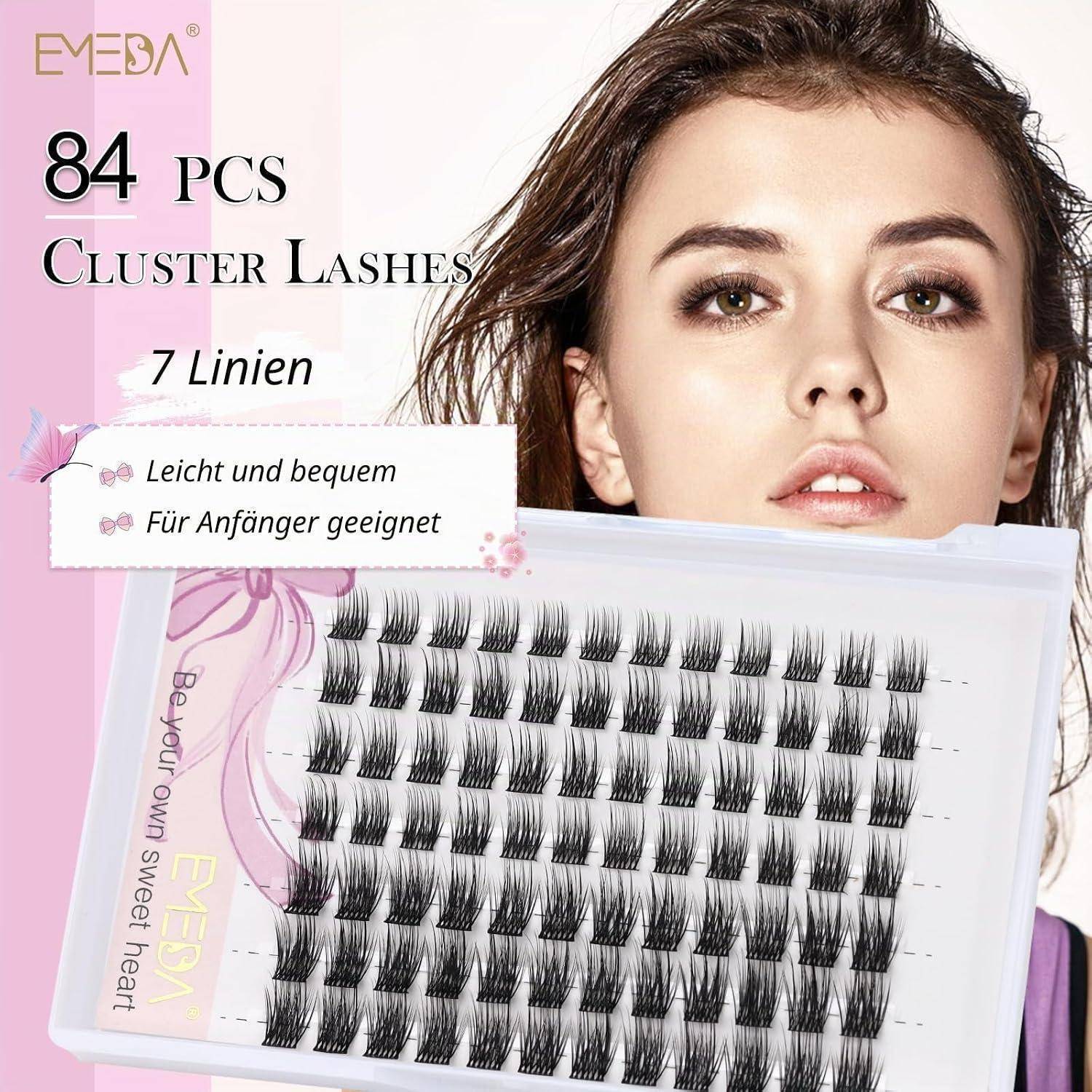 Verpackung für EMEDA 84 Stück Cluster-Wimpern, 7 Reihen; Modell hält ein Tablett mit falschen Wimpernbüscheln, mit deutschem Text, der 