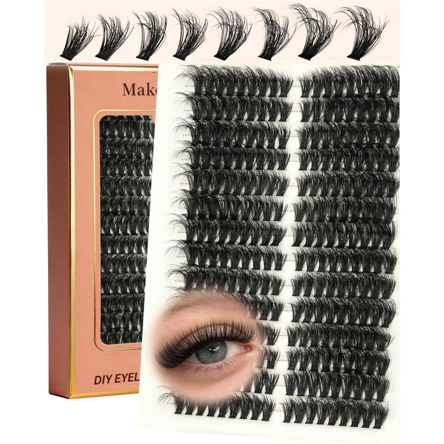 DIY-Wimpernset mit mehreren schwarzen Wimpernbüscheln, einer Schachtelverpackung und einem Beispiel eines Auges mit den Wimpern.