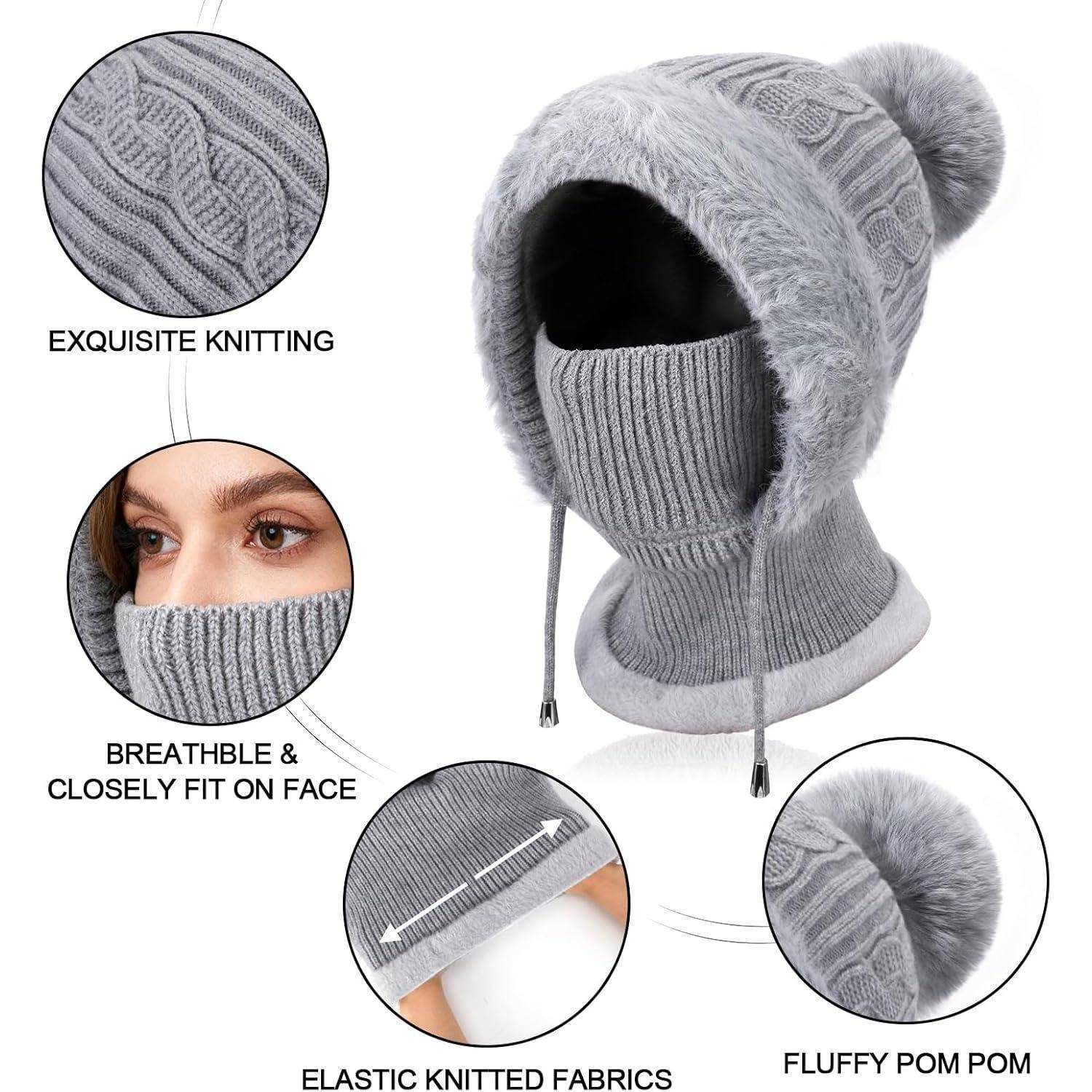 Graue gestrickte Wintermütze mit Gesichtsöffnung, Pelzkante und Bommel, gezeigt mit Nahaufnahmen, die Stricktextur, Atmungsaktivität und elastische Passform hervorheben.