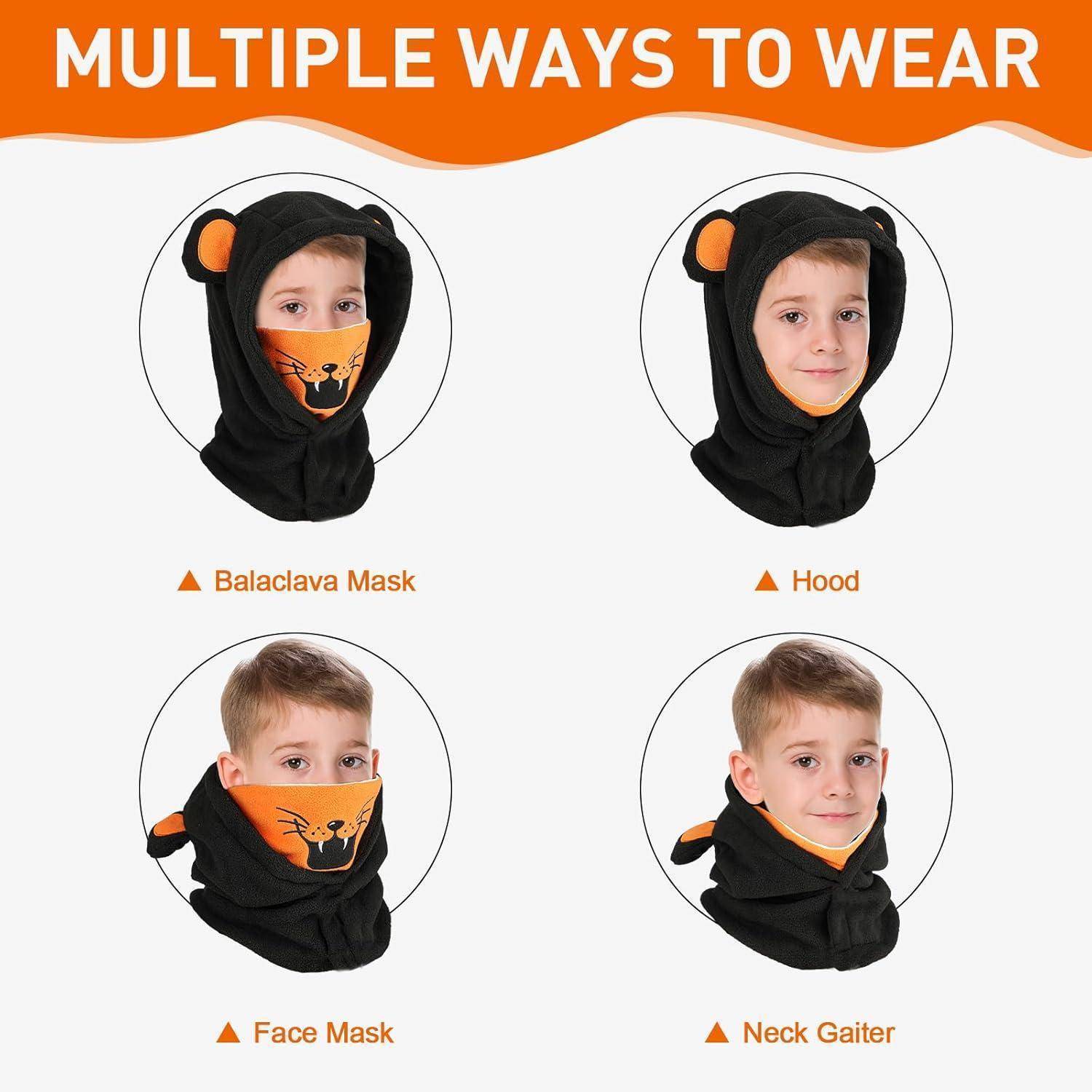 Infografik mit dem Titel "Mehrere Trageweisen"" zeigt eine schwarze und orangefarbene Tiergesichtsmaske für Kinder, getragen als Sturmhaube, Kapuze, Gesichtsmaske und Nackenmanschette.