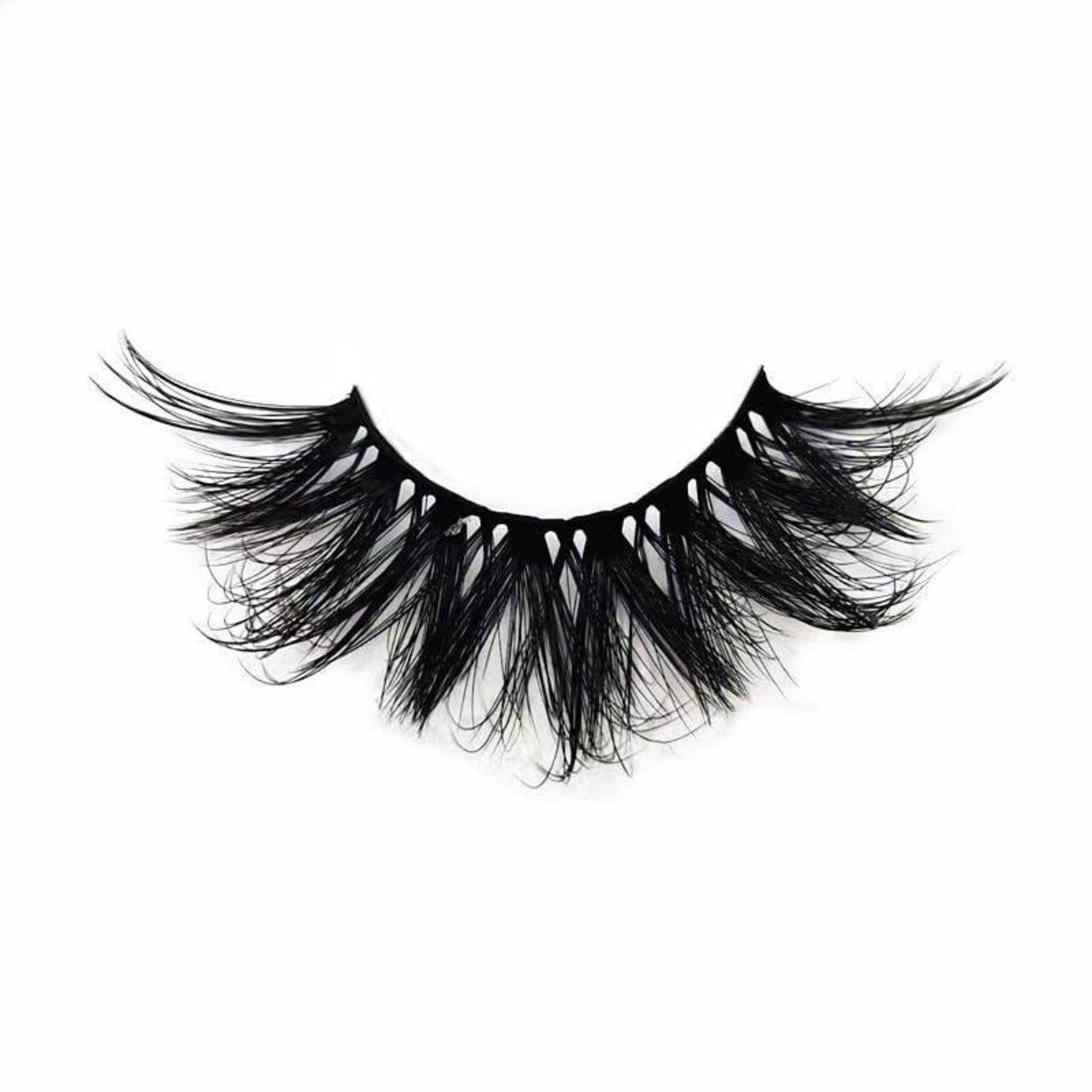 Schwarze künstliche Wimpern mit langen, dramatischen, feinen Wimpern auf weißem Hintergrund.