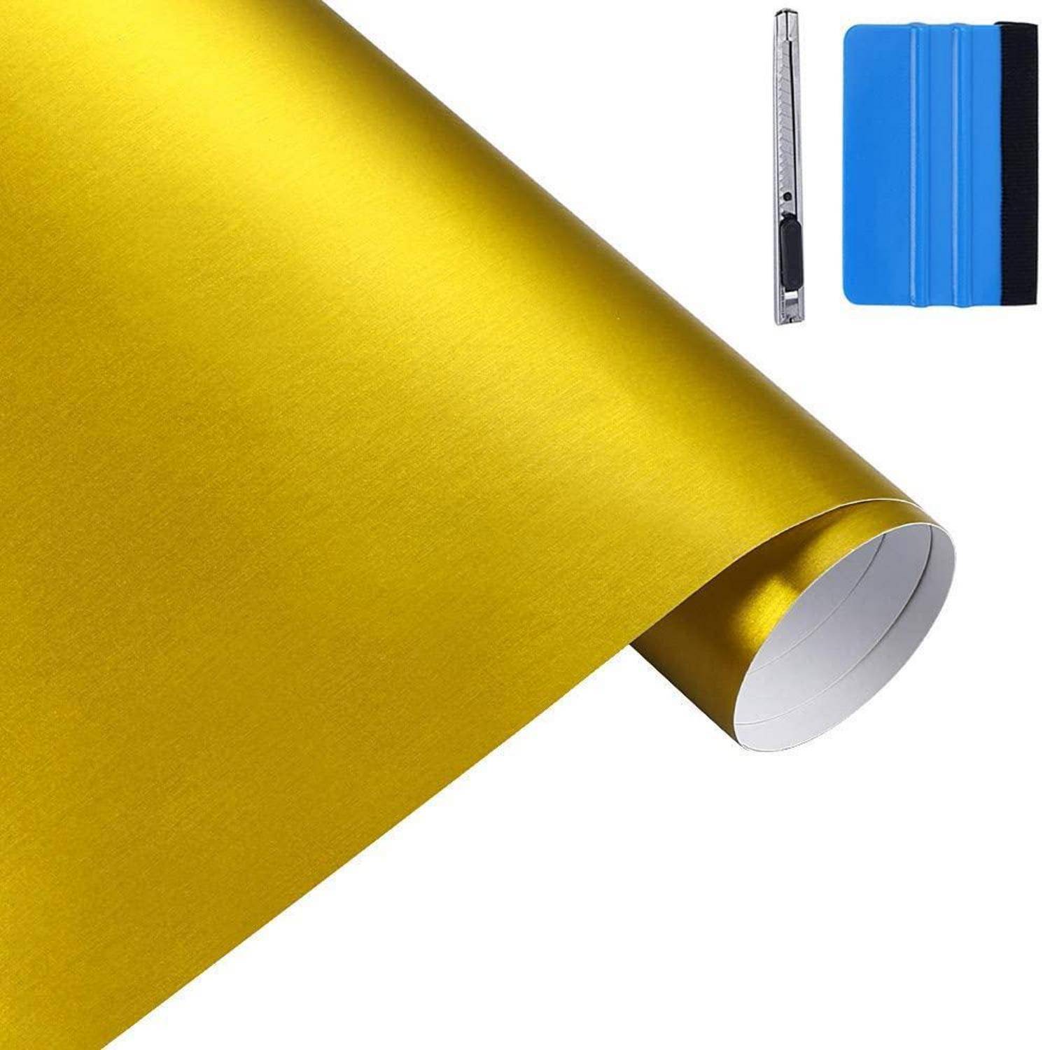 Goldhaftende Vinylrolle mit kleinem Schneidewerkzeug und blauem Rakel auf weißem Hintergrund.