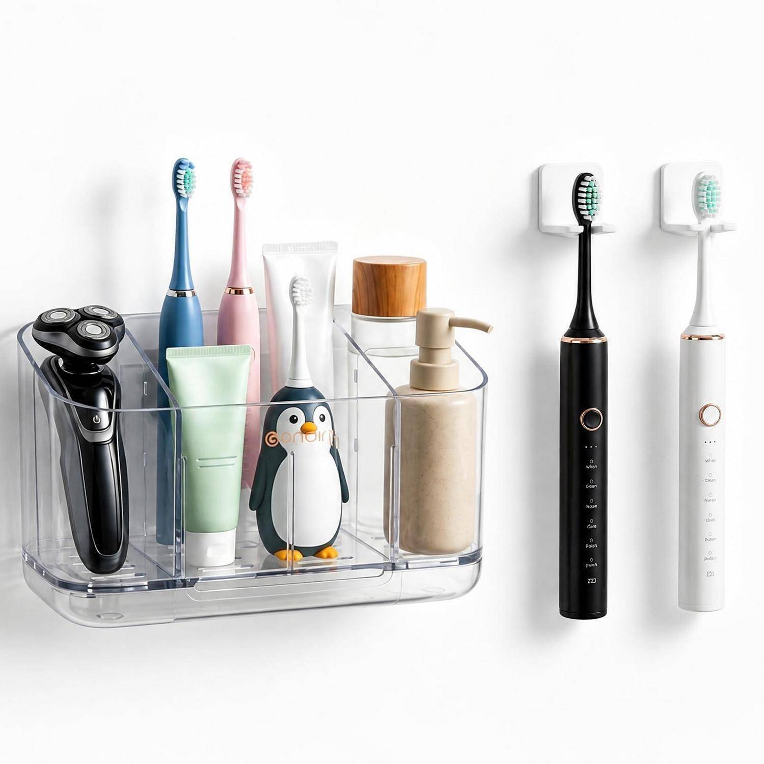 Zahnbürsten- und Grooming-Organizer, der einen Elektrorasierer, Zahnpasta, Zahnbürsten, einen Pinguin-Timer und einen Seifenspender hält, mit zwei wandmontierten elektrischen Zahnbürsten daneben.