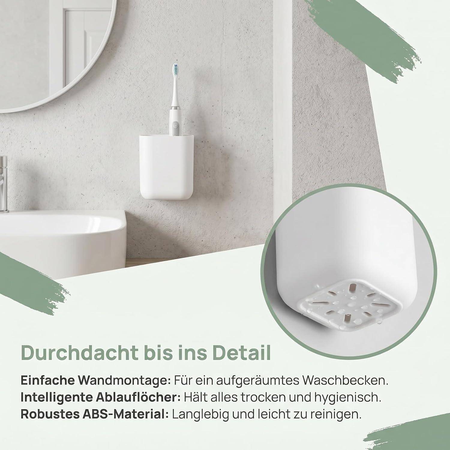 Wandmontierter Zahnbürstenhalter über einem Waschbecken, mit Nahaufnahme der Drainagelöcher; Deutscher Text besagt „Durch und durch im Detail