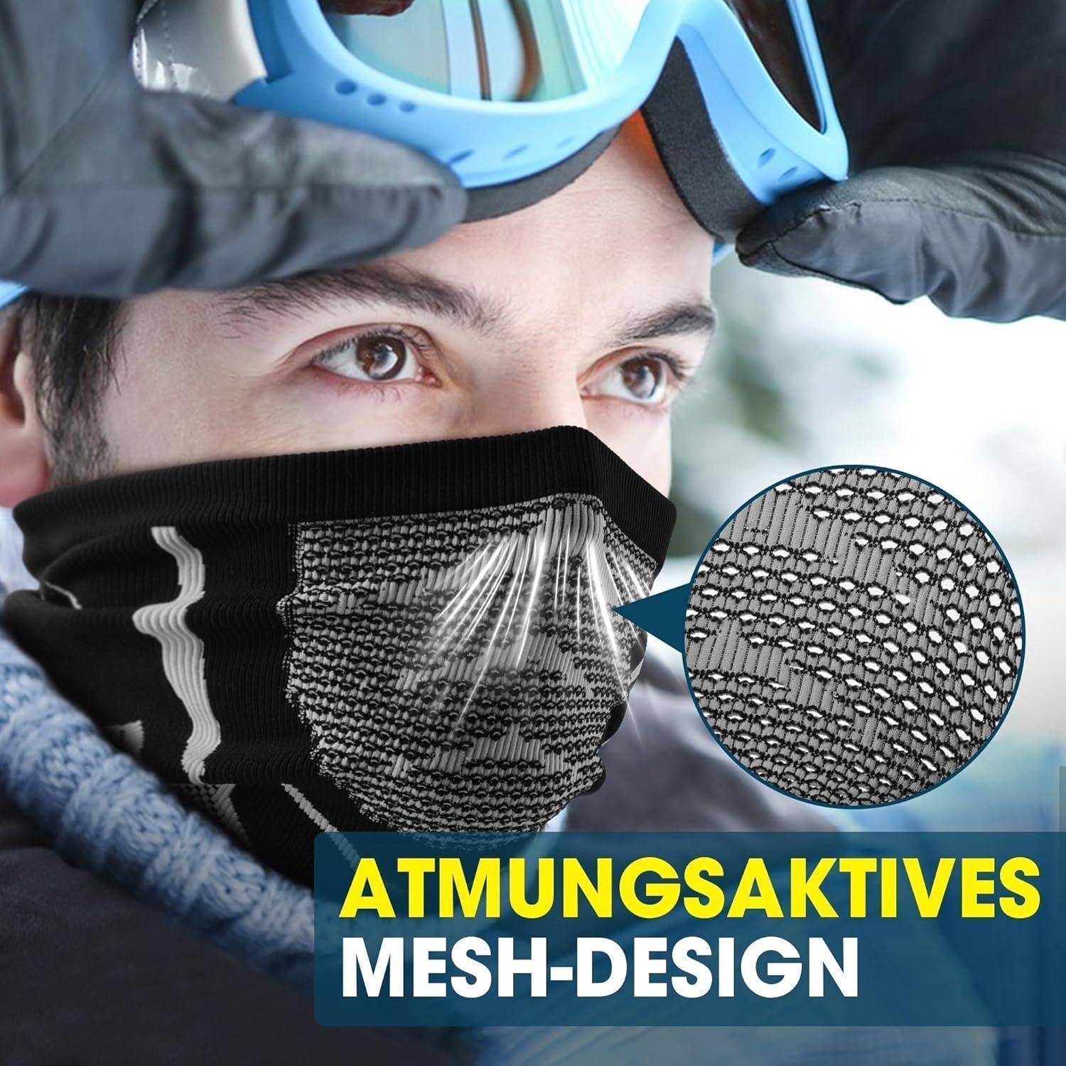 Person trägt blaue Skibrillen und eine schwarze Gesichtsmaske mit der Bezeichnung „ATMUNGSAKTIVES MESH-DESIGN", mit einer Nahaufnahme, die die Maschenstruktur zeigt.