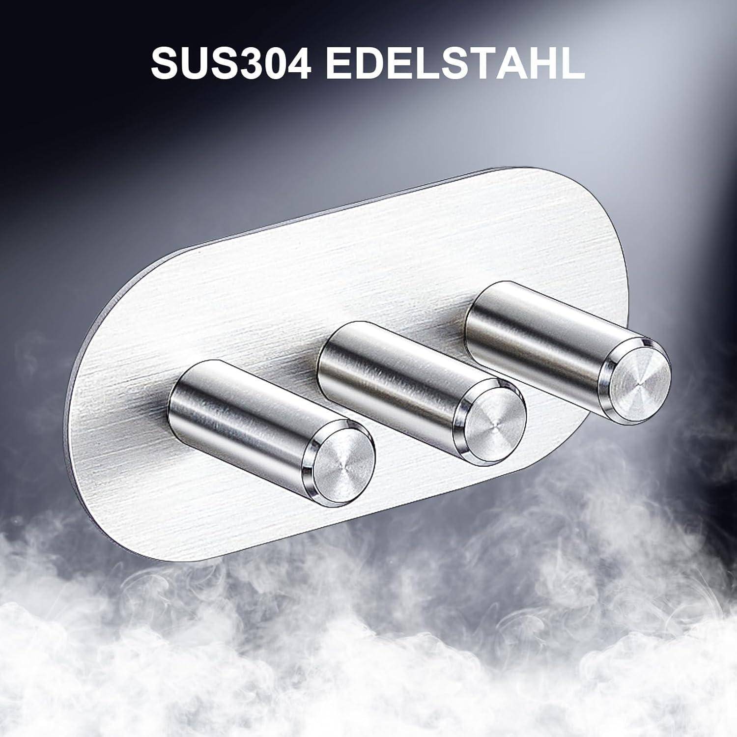 SUS304-Edelstahlwandmontage-Platte mit drei zylindrischen Haken auf rauchgrauem Hintergrund.