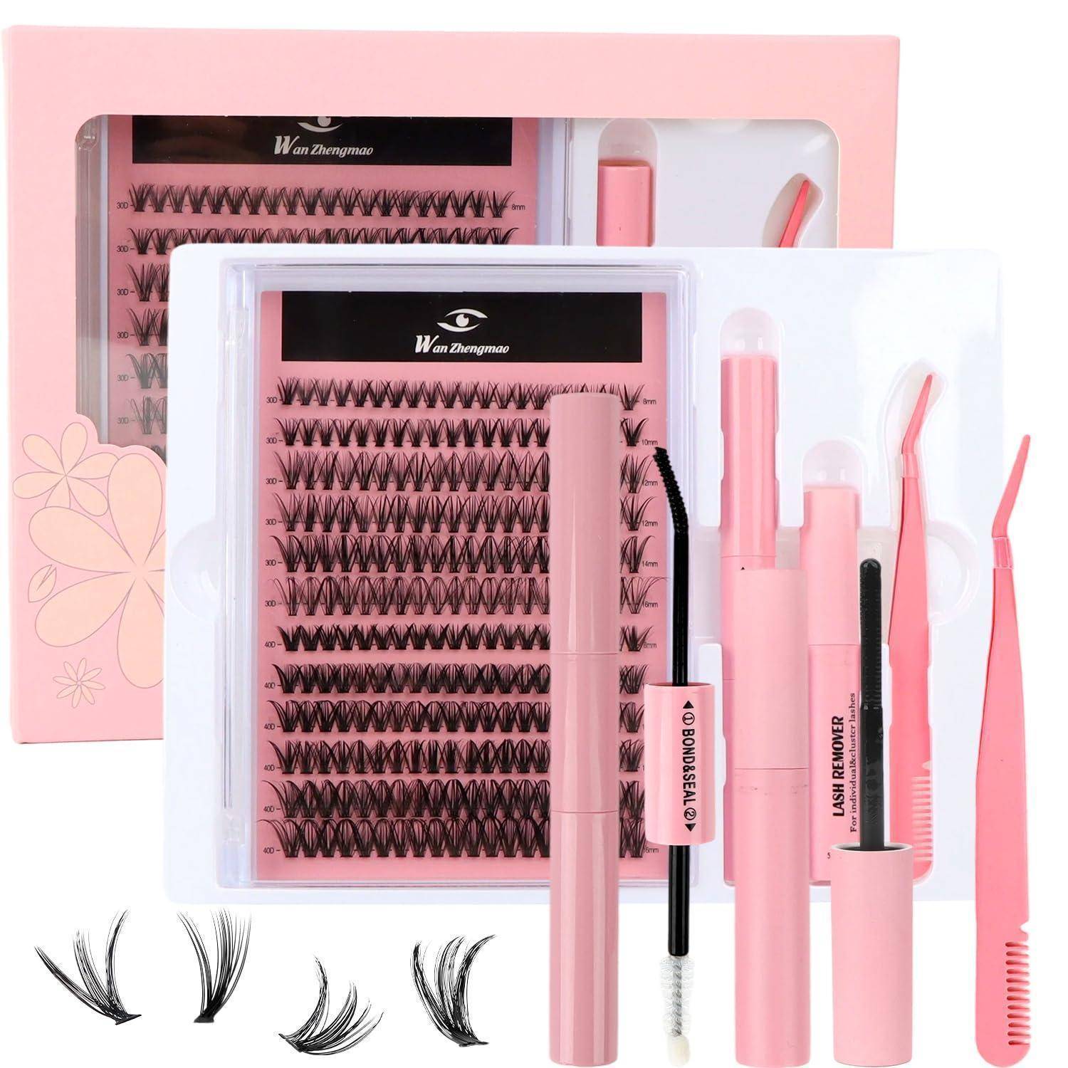 Erweiterungsset für rosa Wimpern mit mehreren Tabletts mit künstlichen Wimpern, Wimpernkleber, Applikatoren und rosa Pinzetten/Kämmen.