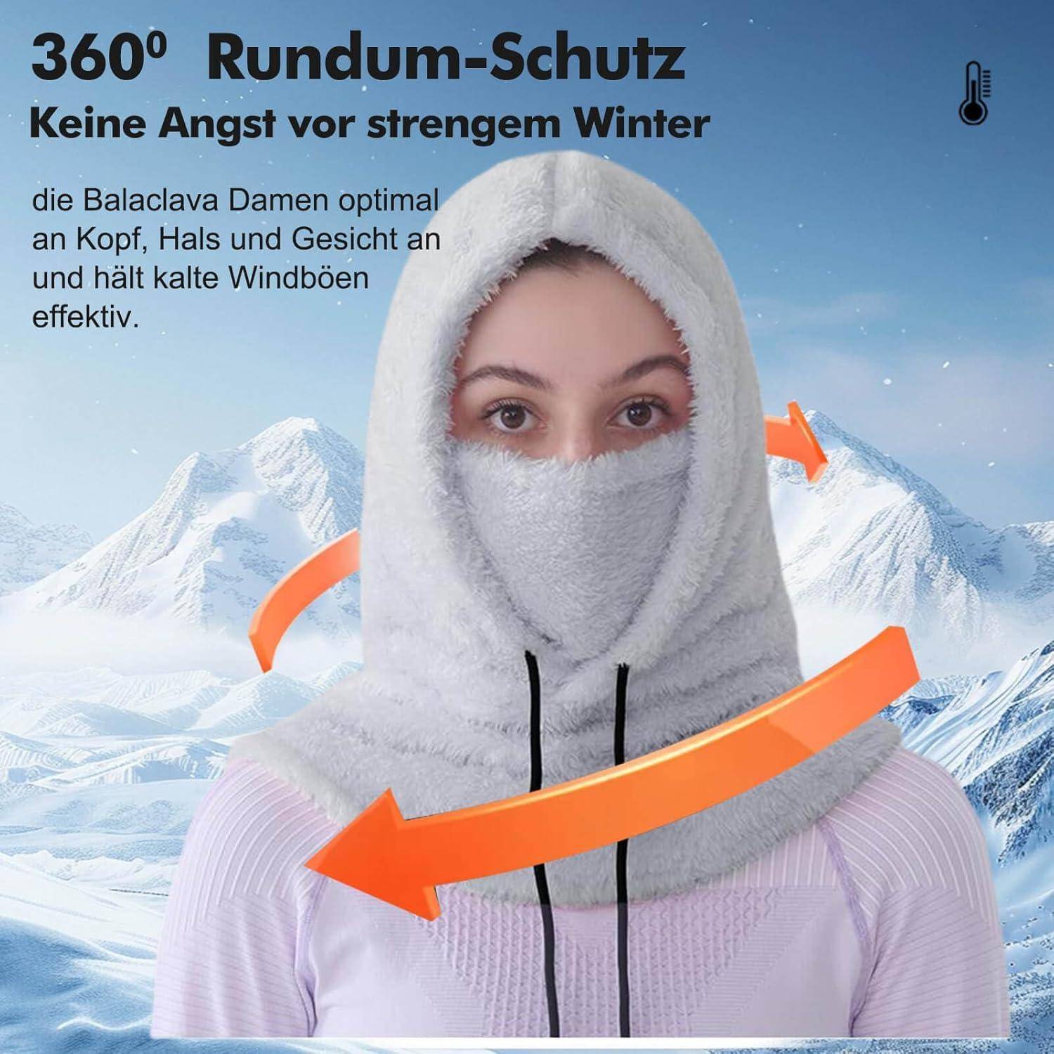 Frau, die eine graue Sturmhaube und Kapuze in einer verschneiten Berglandschaft trägt, mit Pfeilen, die 360-Grad-Schutz vor Wind und Kälte anzeigen.