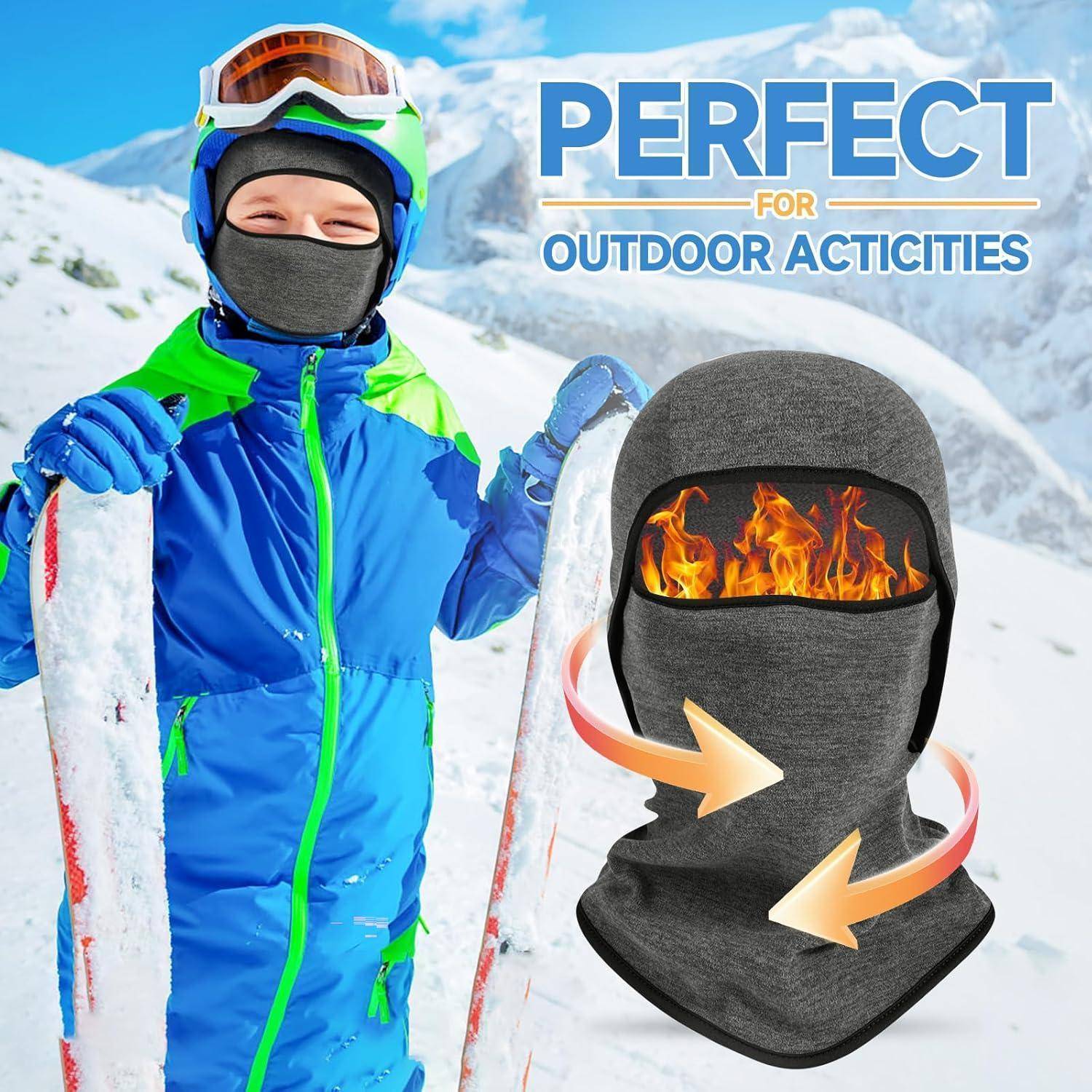 Kind in Skiausrüstung hält Skier in verschneiten Bergen; Text sagt „PERFEKT FÜR OUTDOOR-AKTIVITÄTEN IN DER ARKTIS" neben einer beheizten Gesichtsmaske mit Flammen und Pfeilen