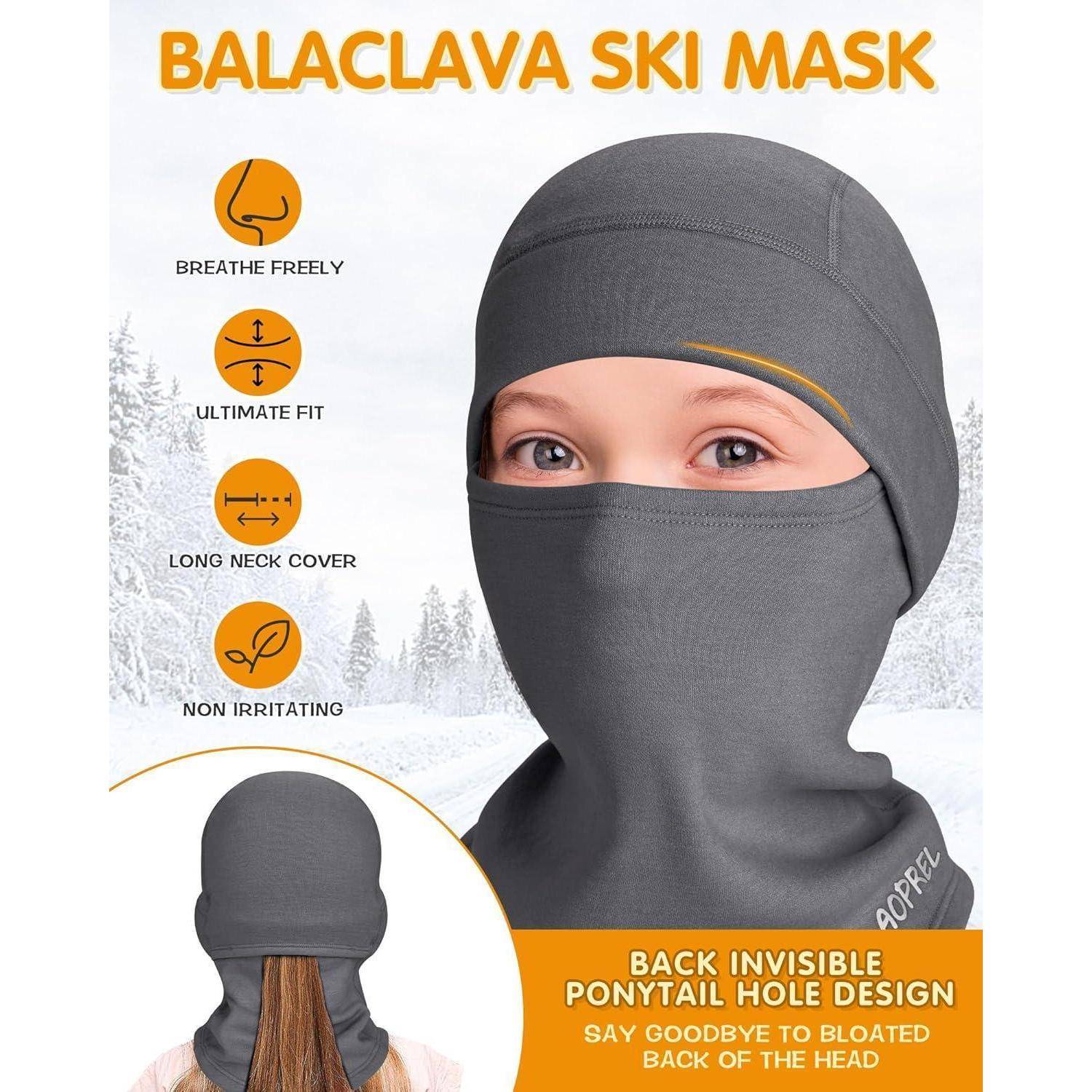 Produktanzeige für eine graue Balaclava-Skimaske an einem Kind mit Ponytail-Öffnung auf der Rückseite und gekennzeichneten Merkmalen: atmungsaktiv, perfekte Passform, langer Halsschutz, nicht reizend.