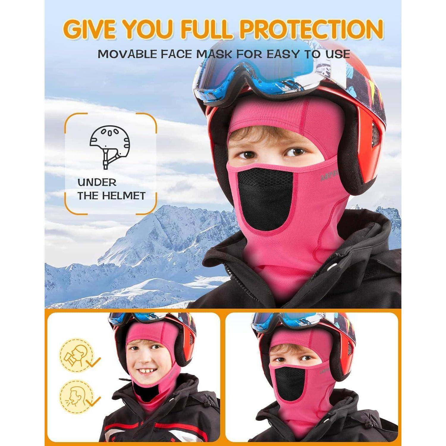 Werbebild eines Kindes, das eine rosa Gesichtsskimaske unter einem Helm trägt, mit dem Text „GIBT DIR VOLLSTÄNDIGEN SCHUTZ" und „UNTER DEM HELM"", gezeigt vor verschneiten Bergen.