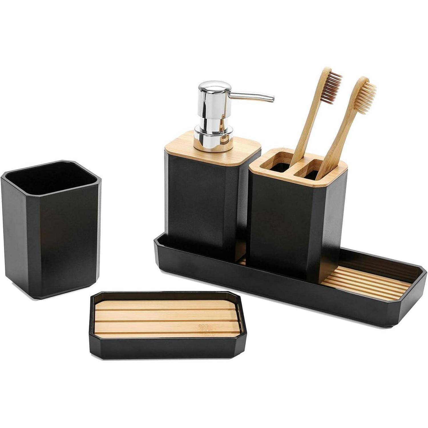 Schwarzes Badezimmer-Zubehörset mit Seifenspender, Zahnbürstenhaltern, Becher und Tablett mit Bambusapplikationen.