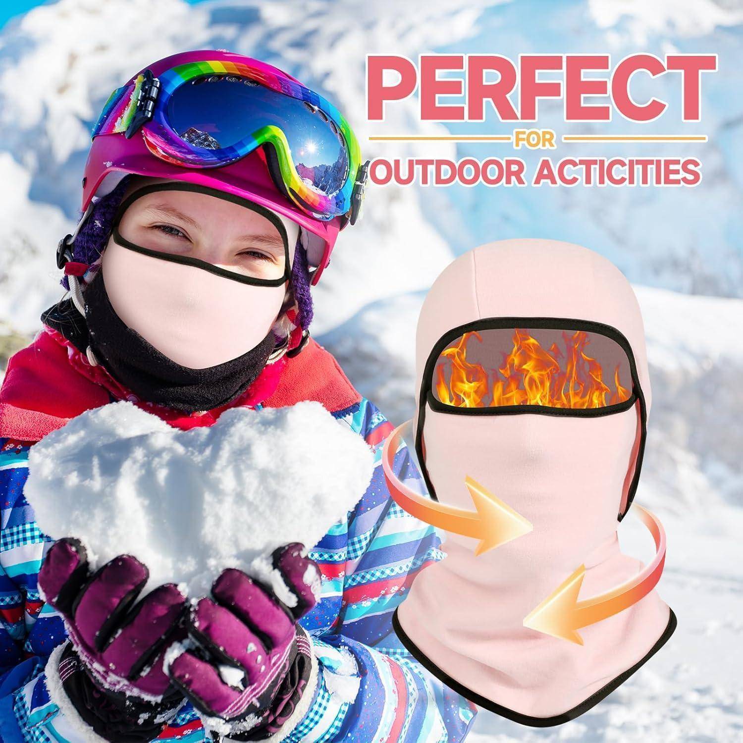 Kind in Winterkleidung hält Schnee, daneben eine Grafik einer beheizten Gesichtsmaske unter dem Text „PERFEKT FÜR OUTDOOR-AKTIVITÄTEN".