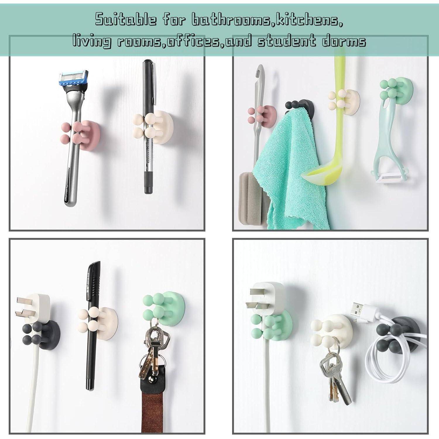 Produktanzeige mit wandmontierten handförmigen Haltern, die Werkzeuge, Zahnbürsten, Handtücher, Schlüssel und Kabel für die Verwendung im Badezimmer, in der Küche, im Büro oder im Wohnheim greifen.