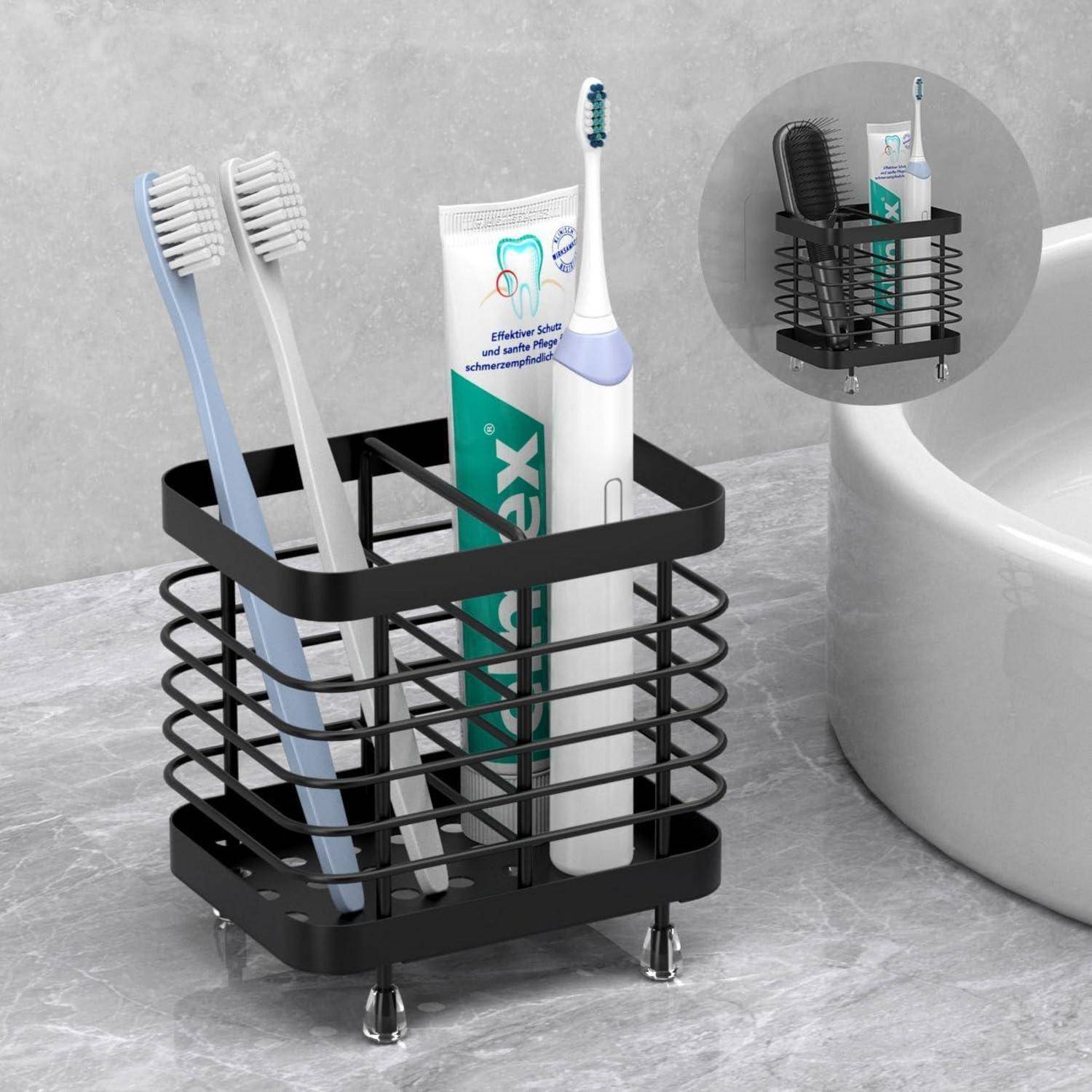 Schwarzer Arbeitsplattenorganizer mit einem Drahtkorb, der zwei Zahnbürsten, eine Zahnpastatube und eine elektrische Zahnbürste neben einem Waschbecken hält.