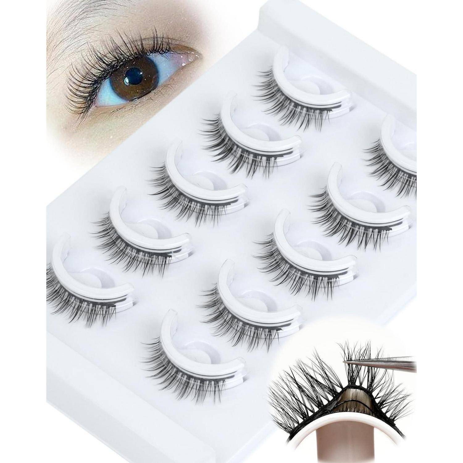 Anzeige von künstlichen Wimpernstreifen in einem weißen Tablett, mit einer Nahaufnahme eines Auges, das die getragenen Wimpern zeigt.