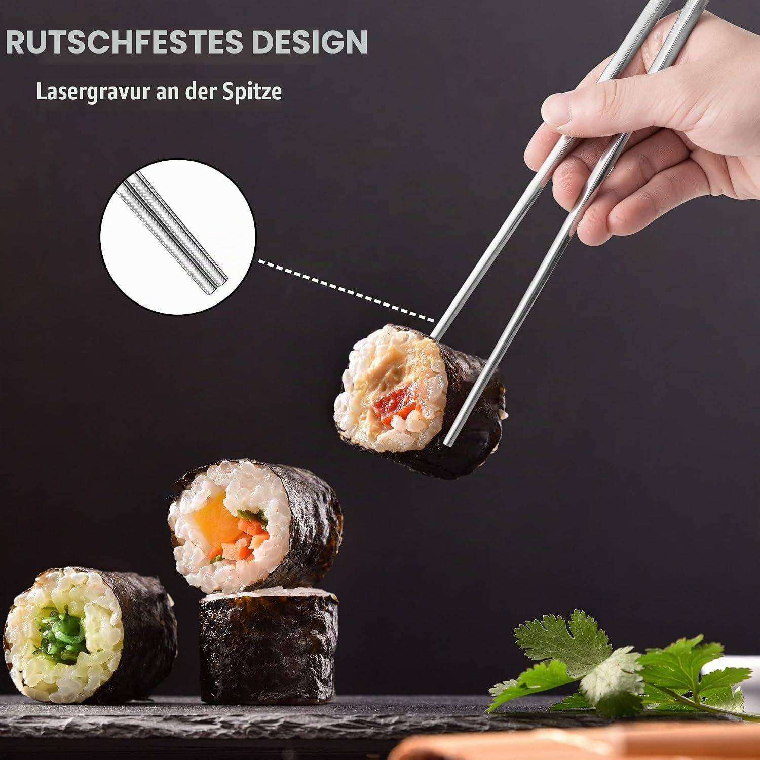 Sushi-Rollen mit einer strukturierten, rutschfesten Stäbchenspitze, die ein Stück greift; der Text lautet „RUTSCHFESTES DESIGN