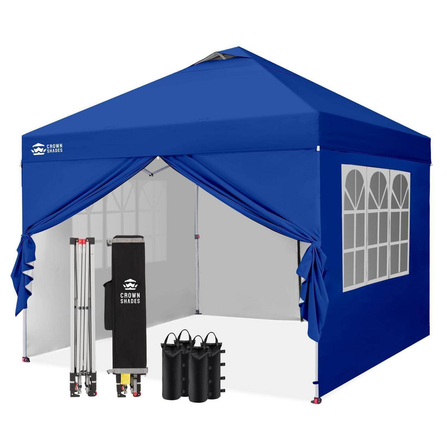 Blaues Pop-Up-Pavillon-Zelt mit offener Vorderseite, Seitenfenster-Panel und enthaltenen Gewichtsbeuteln und Faltrahmen-Teilen, die innen angezeigt werden.