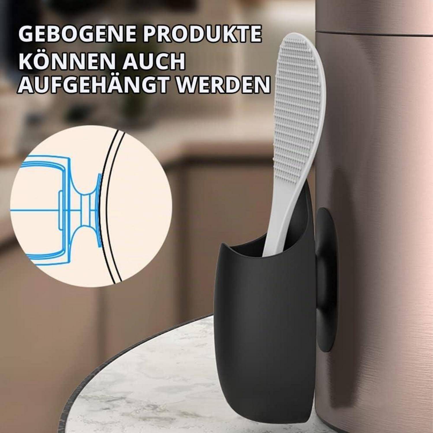 Schwarzer, an einer gekrümmten Fläche befestigter Wandhalter, der eine weiße Bürste hält; Text besagt „GEBOGENE PRODUKTE KÖNNEN AUCH AUFGEHÄNGT WERDEN
