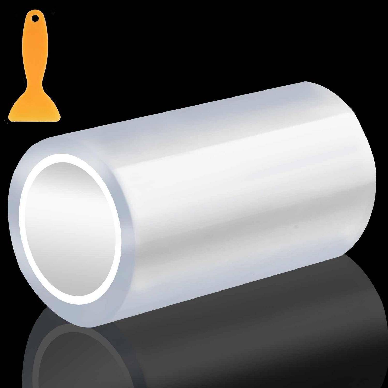 Weiße Klebrollen mit abnehmbarem orangefarbenem Griff auf schwarzem Hintergrund, dargestellt mit dunklem Spiegelbild.