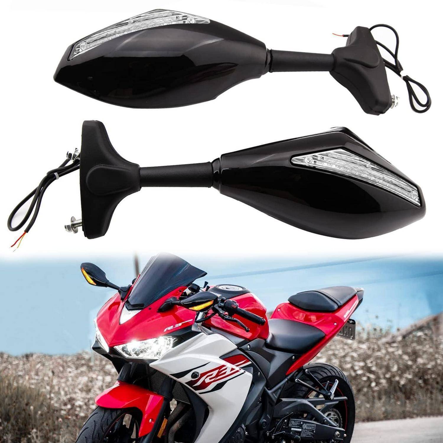 Schwarze Motorrad-Blinkleuchten oben abgebildet und auf einem roten Sportmotorrad installiert, was das Ersatzteil in Gebrauch zeigt.