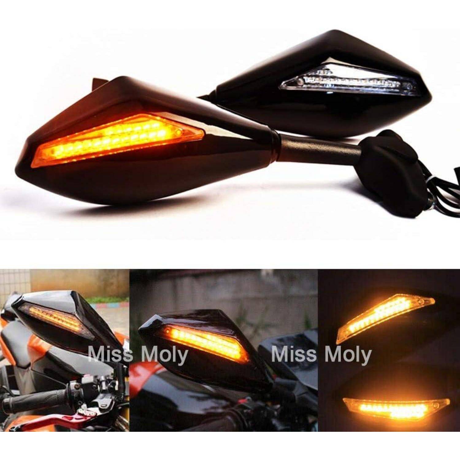 Motorrad-LED-Blinkleuchten leuchten in Bernstein auf, mit mehreren Nahaufnahmen des schwarzen Gehäuses an einem Motorrad.