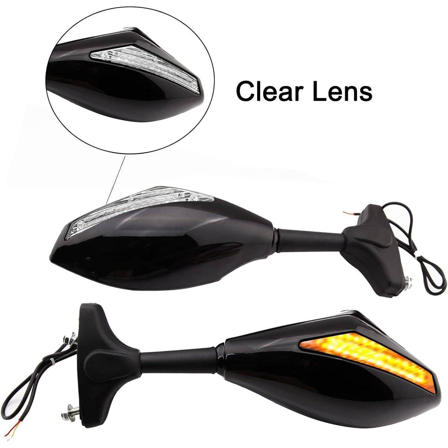 Schwarze Motorrad-Blinker von vorne und hinten dargestellt, mit klarer Linse und illuminiertem Bernsteinlicht auf einem Blinker.