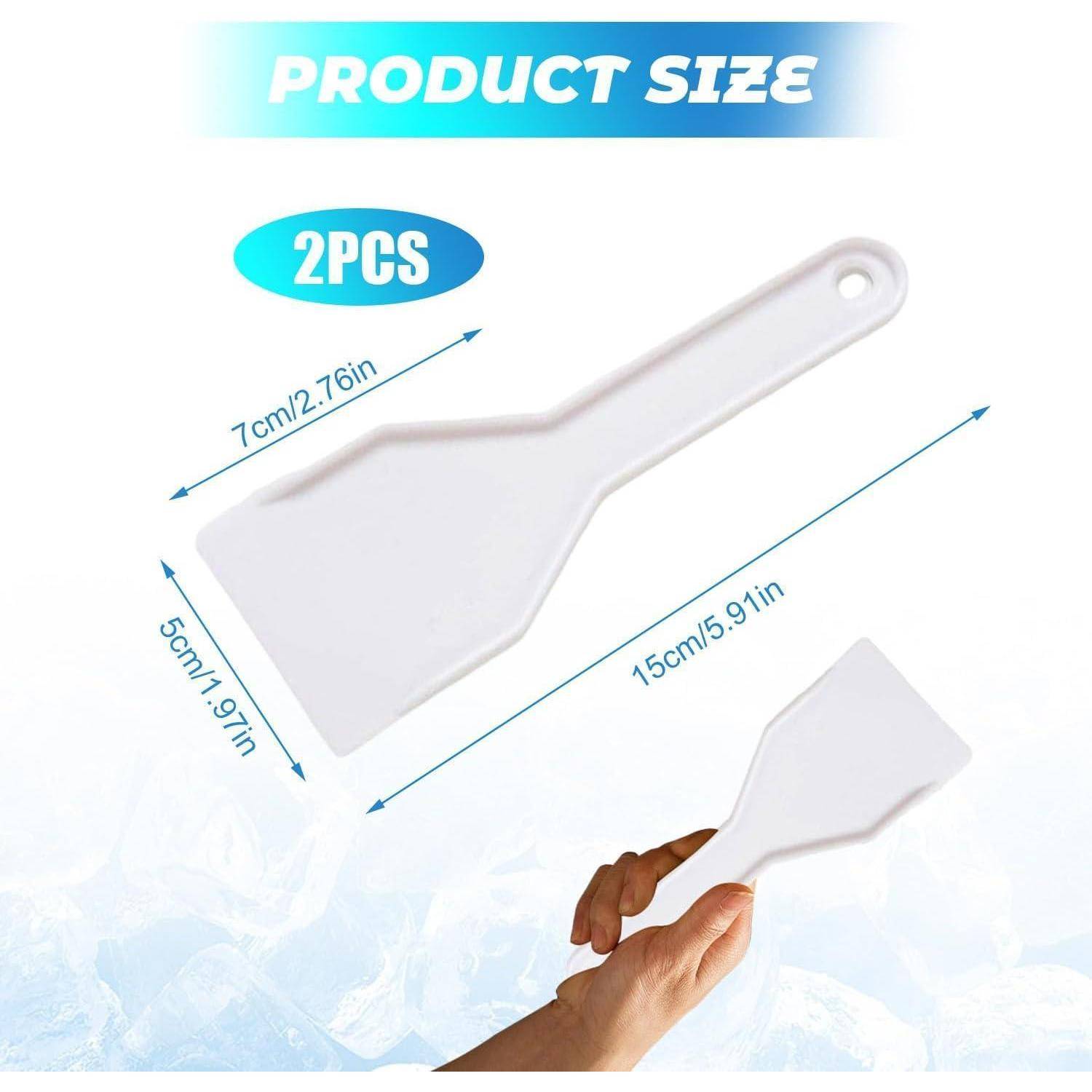 Produktgrößen-Grafik für einen 2-teiligen weißen Kunststofflöffel/Spachtel, der Abmessungen von 15 cm Länge, 7 cm Breite und 5 cm Höhe zeigt, mit einer Hand, die den Artikel hält.