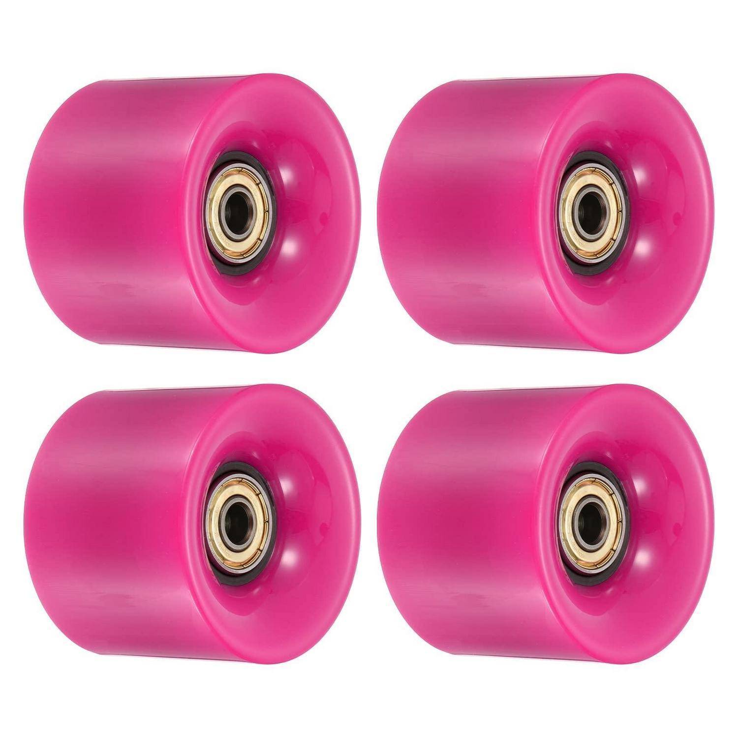 Vier leuchtend rosa Skateboard-Räder mit Metalllagern, in einem 2x2-Gitter auf weißem Hintergrund angeordnet.