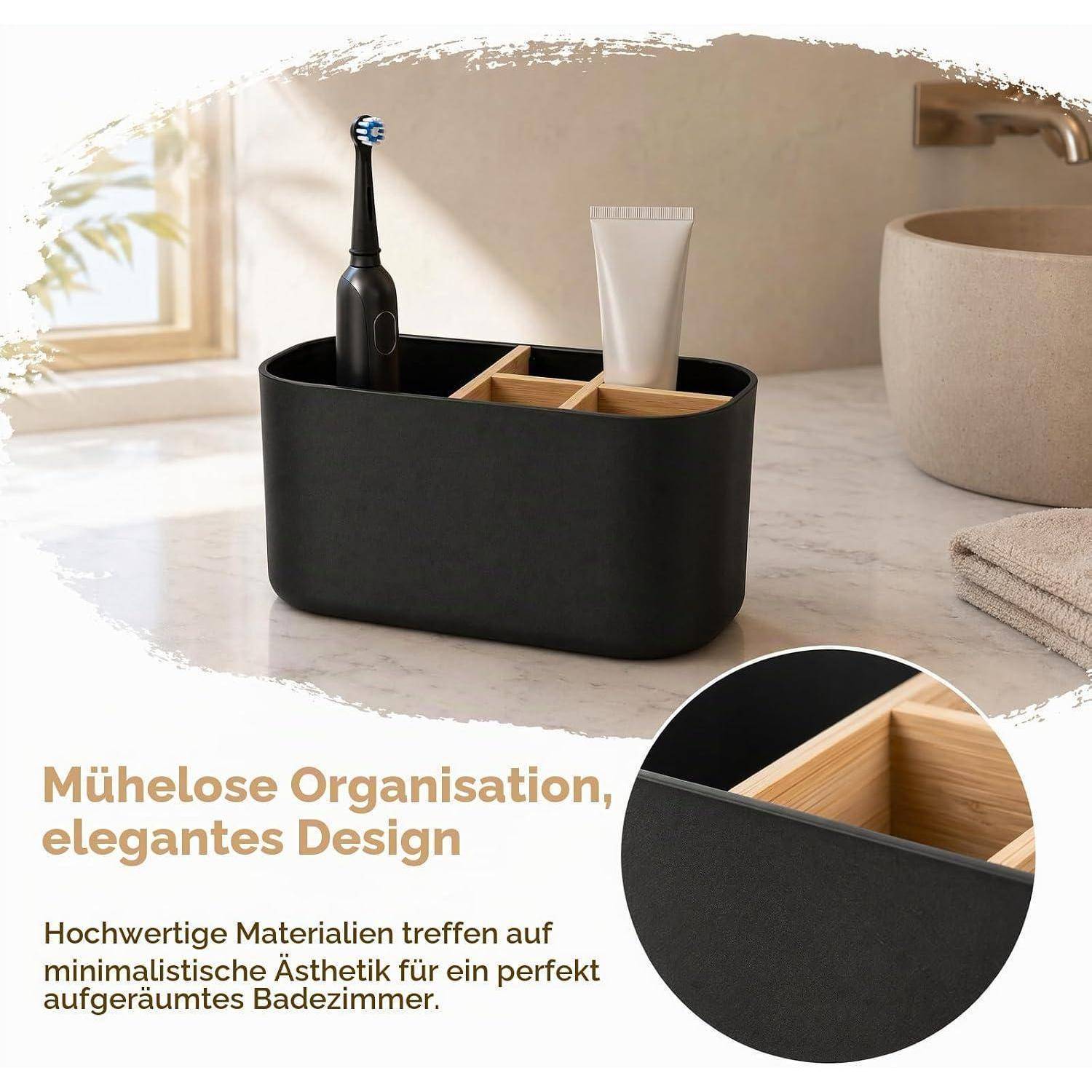 Schwarzer Badezimmer-Organizer-Caddy mit Bamboo-Trennwänden, der eine elektrische Zahnbürste und Zahnpasta hält, gezeigt in einer minimalistischen Badezimmereinrichtung.