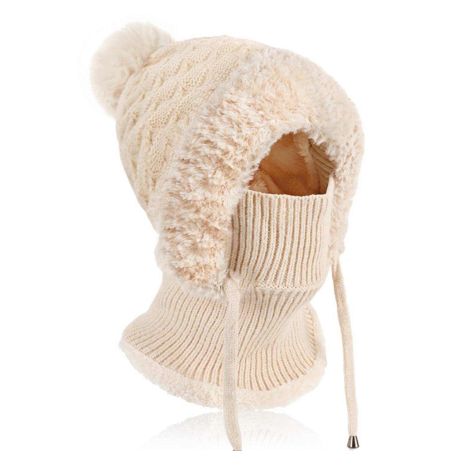 Beigefarbene pelzige Wintermütze mit integrierter gerippter Gesichtsmaske und langen Kinnbändern, gezeigt auf weißem Hintergrund.