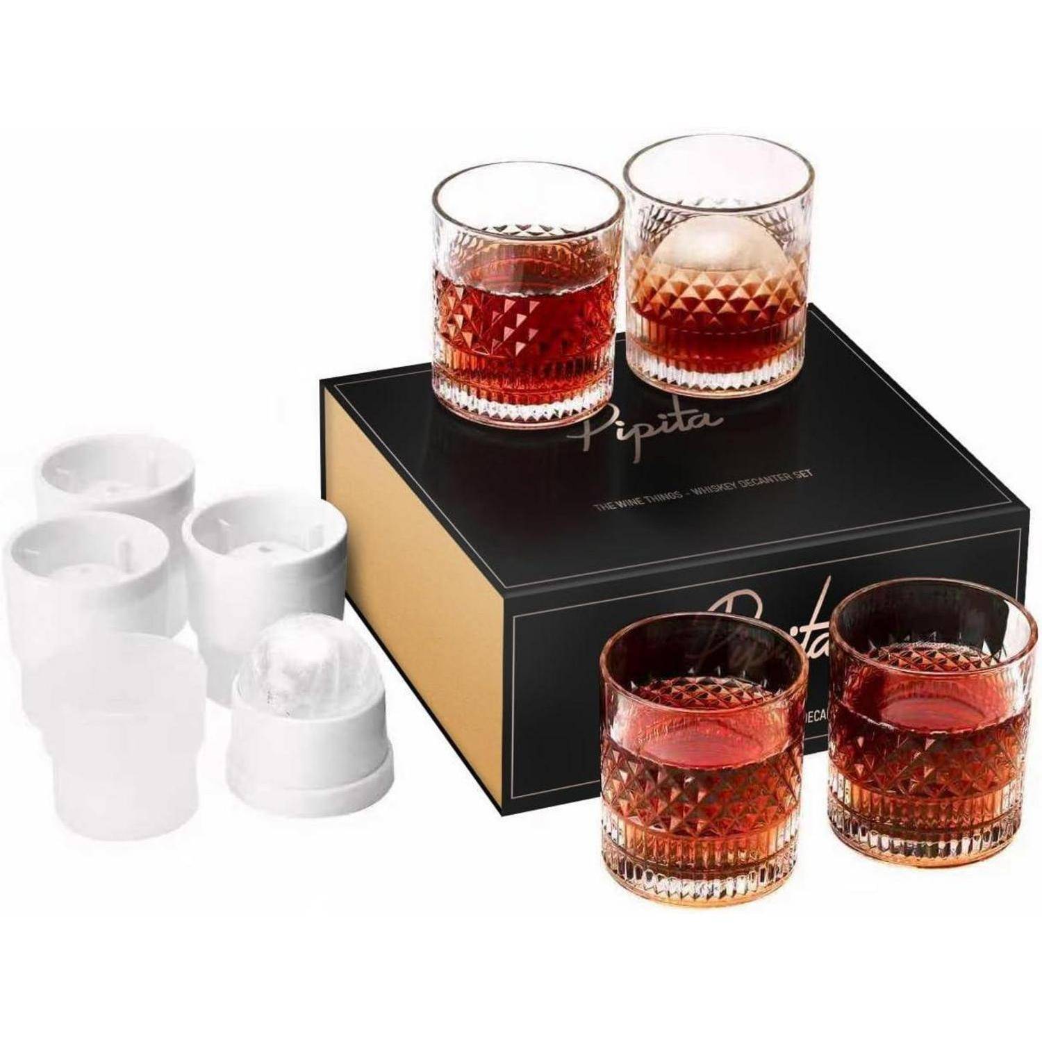 Satz aus vier strukturierten Whiskeygläsern mit Eiswürfeln, dargestellt mit einer schwarzen Geschenkbox und weißen Schutzverpackungseinsätzen.