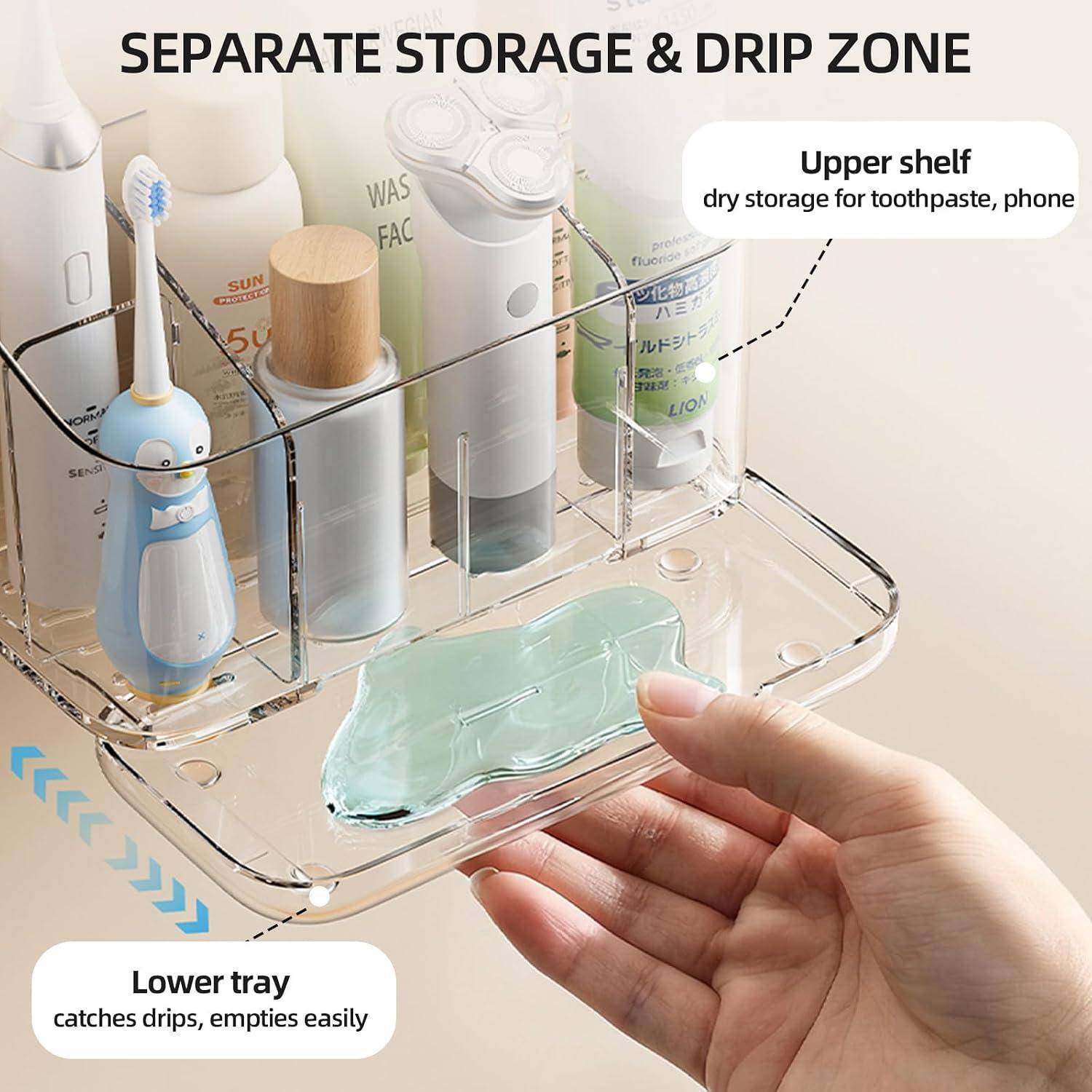 Transparenter Badezimmerorganizer mit separatem oberen Regal zur Trockenlagerung und unterer Auffangschale zum Auffangen von Verschüttungen, dargestellt mit Hygieneartikeln und einer Zahnbürste.