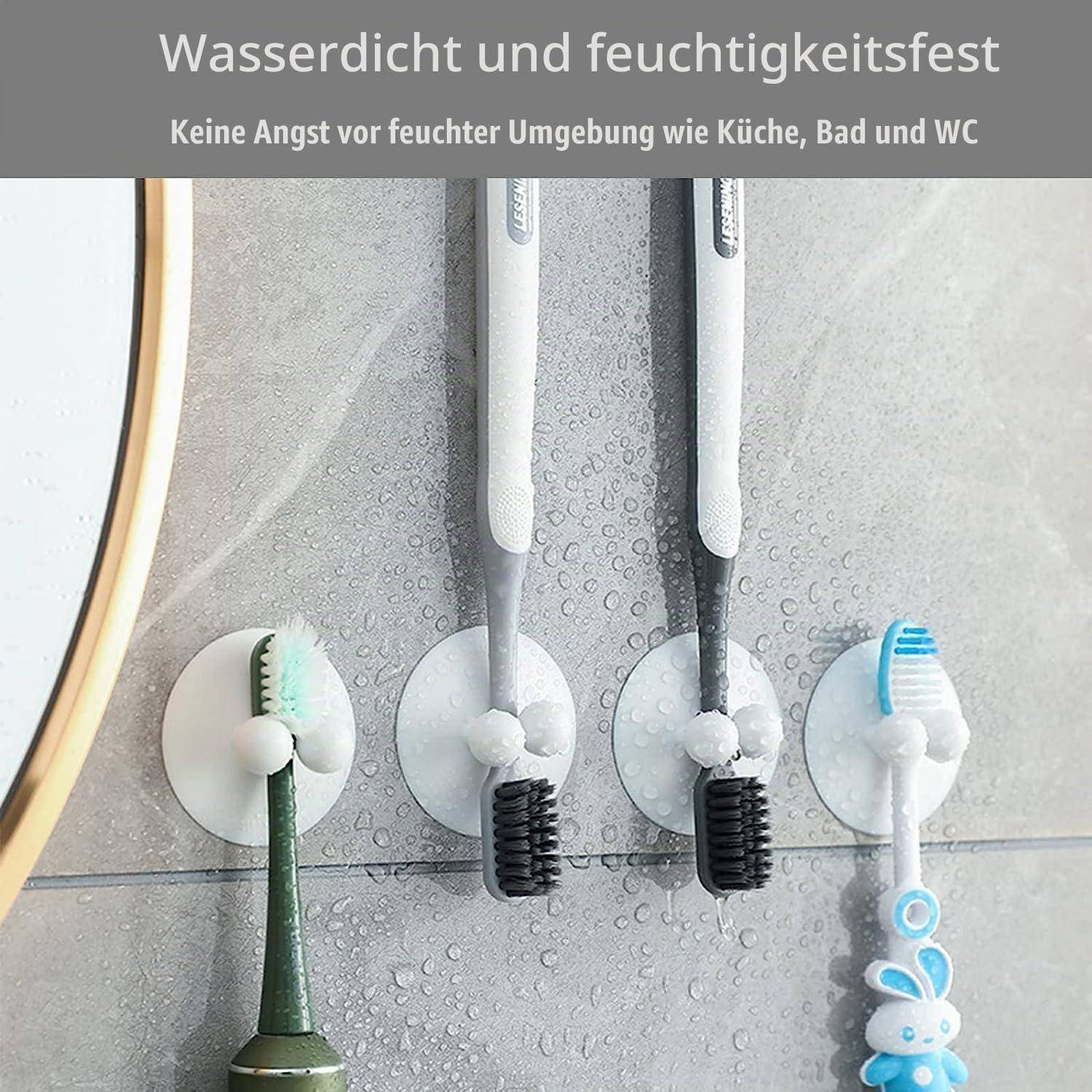 Zahnbürstenhalter an einer feuchten Badezimmerwand montiert, mit deutschem Text, der 
