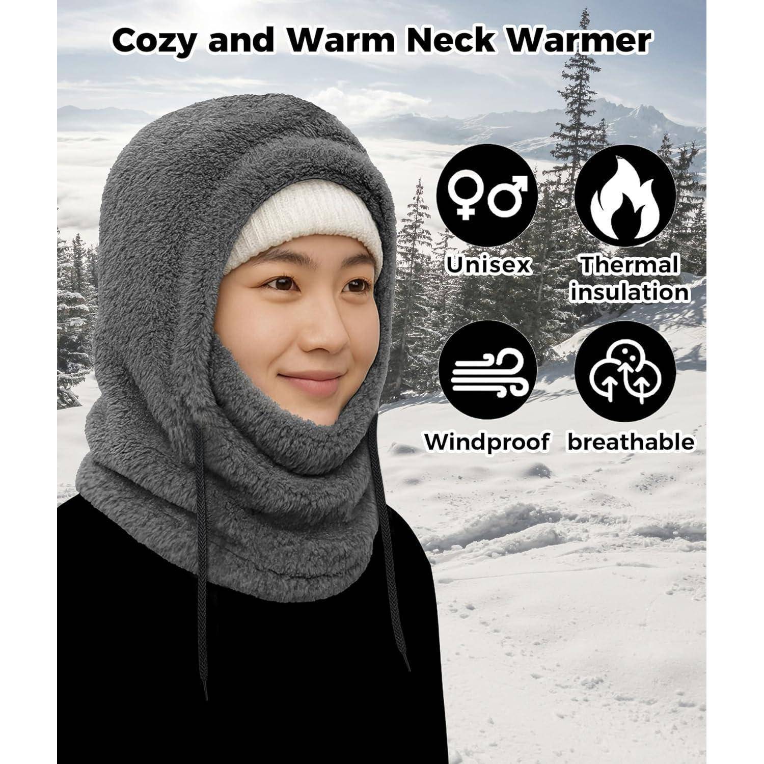 Person trägt eine graue gemütliche Nackenwärmer-Kapuze im verschneiten Freien, mit Text „Gemütlich und warme Nackenwärmer" und Symbolen für unisex, Wärmeisolierung, winddicht und atmungsaktiv.