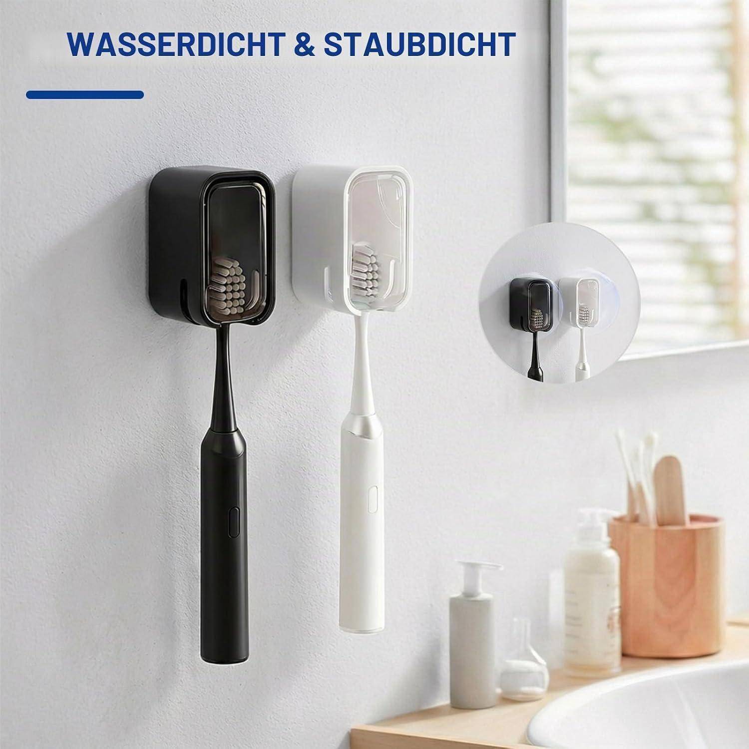 Zwei wandmontierte Zahnbürstenhalter, schwarz und weiß, mit der Aufschrift 