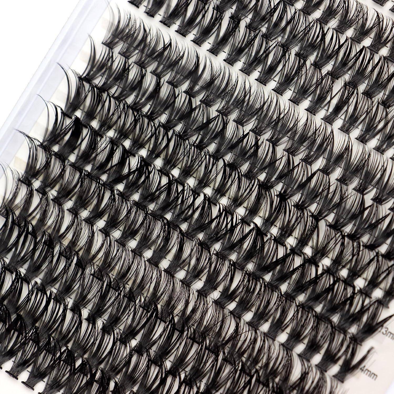 Nahaufnahme eines Tabletts mit gebündelten schwarzen künstlichen Wimpern, dargestellt in Reihen auf weißem Untergrund.